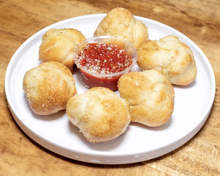 6 Garlic Knots with Sauce.
