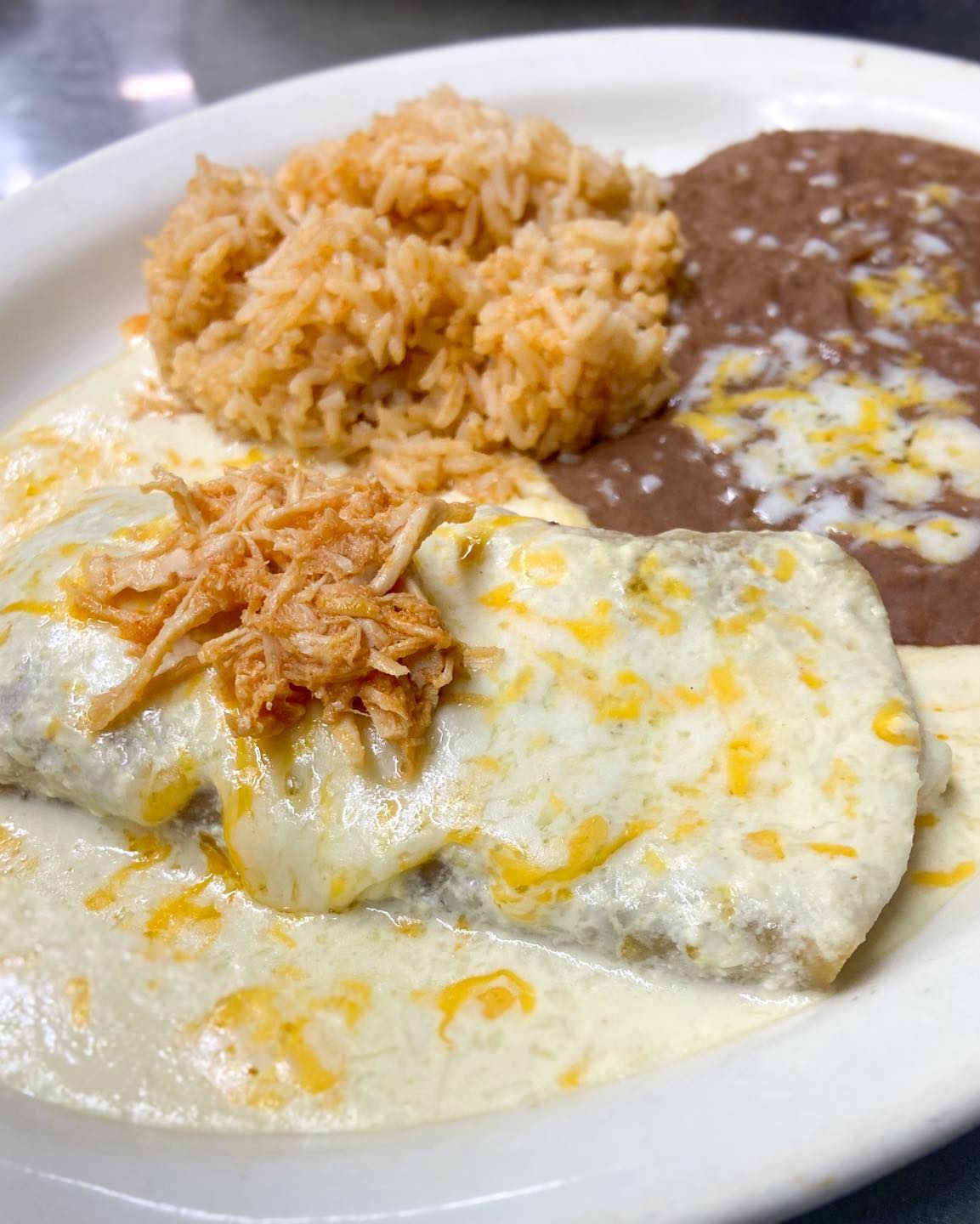 One Enchilada, Rice & Beans.