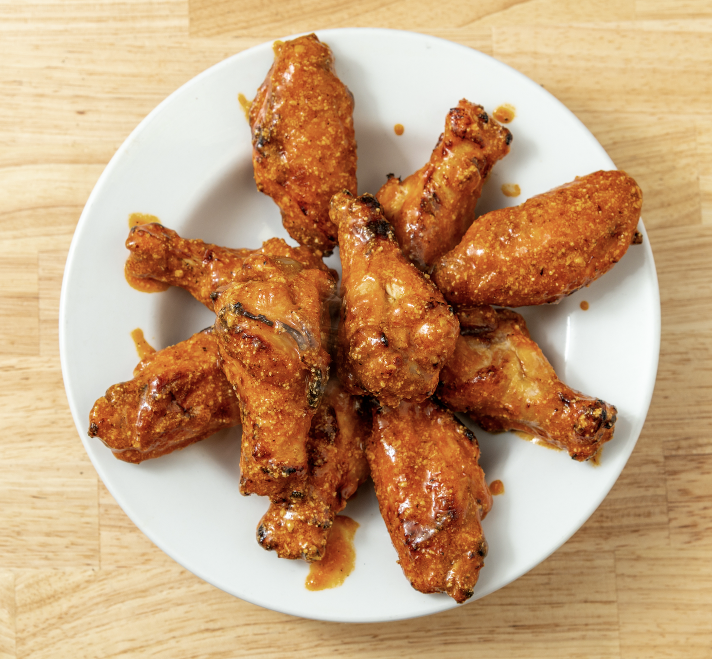 (25) Bone-in chicken wings.