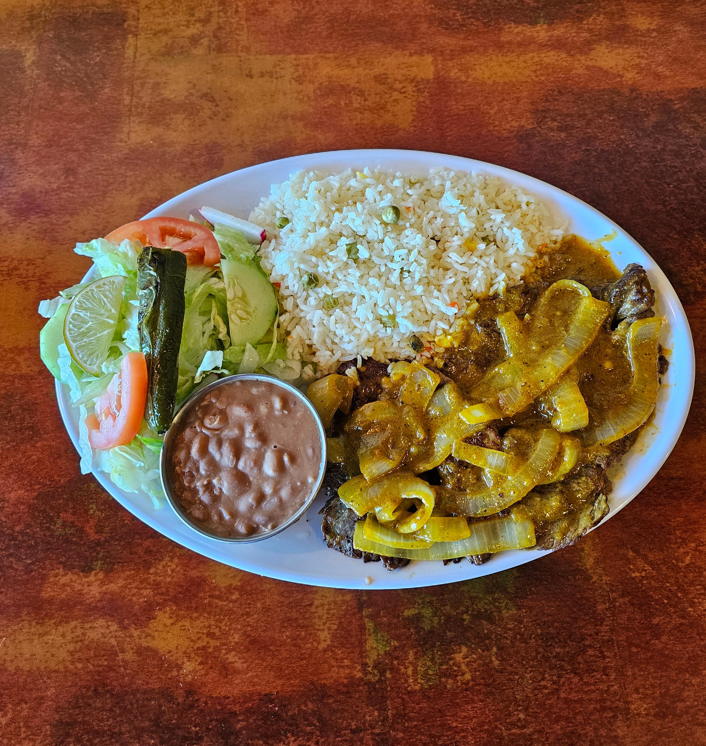 Bistec Encebollado (Sauteed Steak).