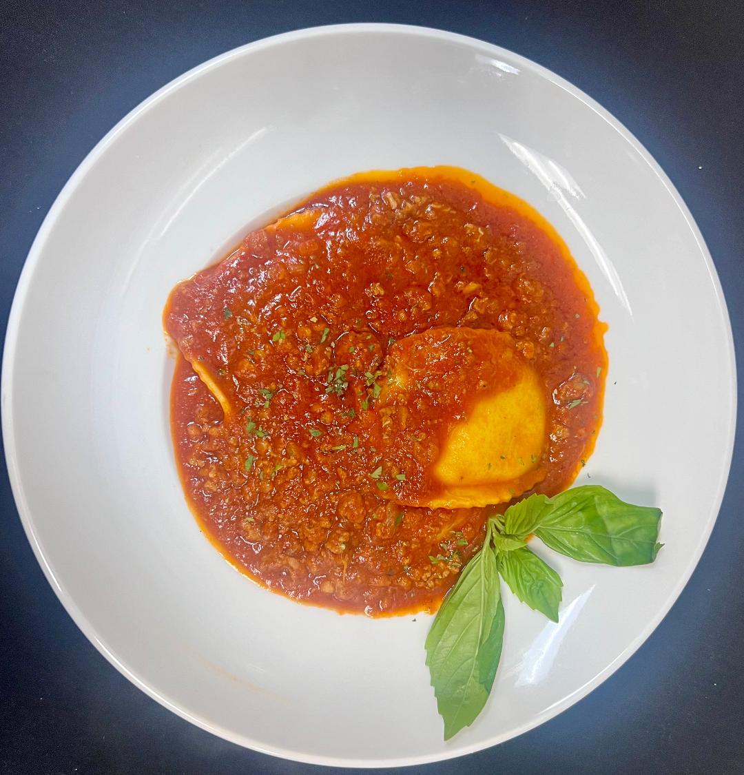 Burrata Ravioli Bolognese.
