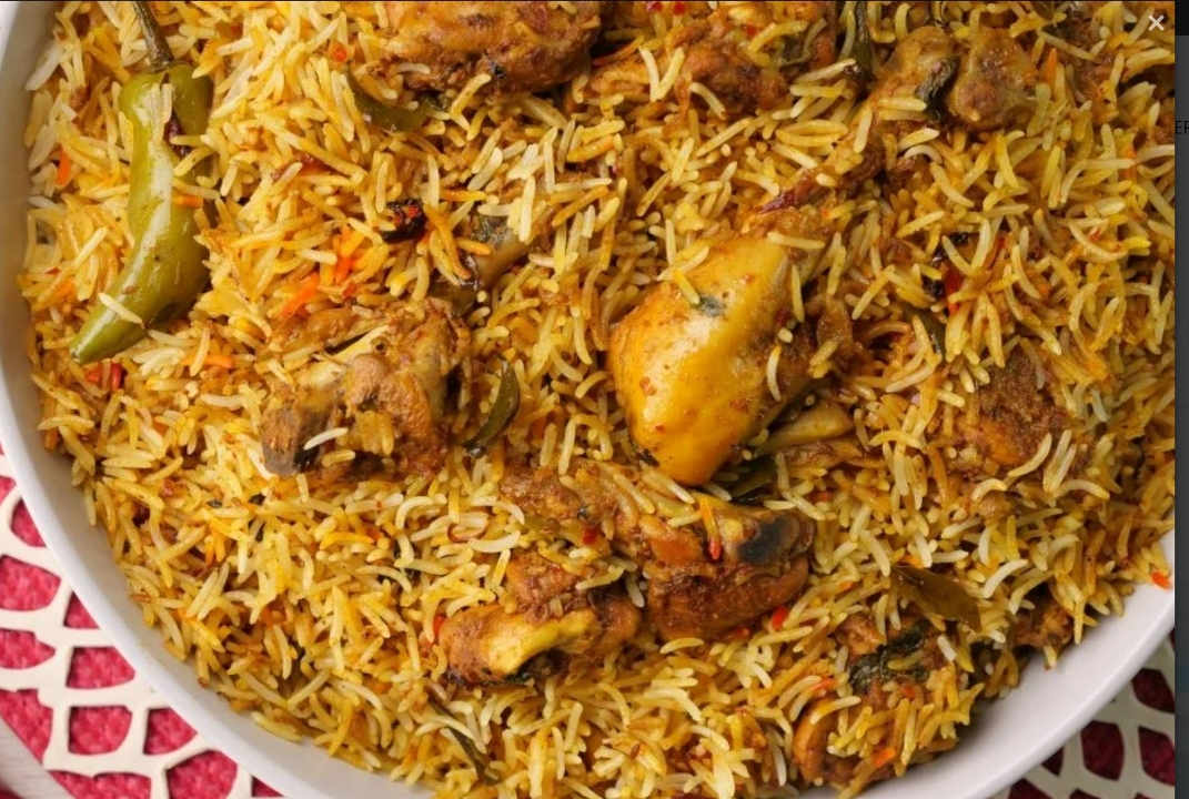 Ghee Roast Mutton Biryani (Signature Item).