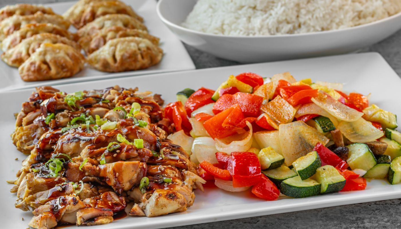 Chicken, Rice, Veggies, & 10 Pc Potstickers.