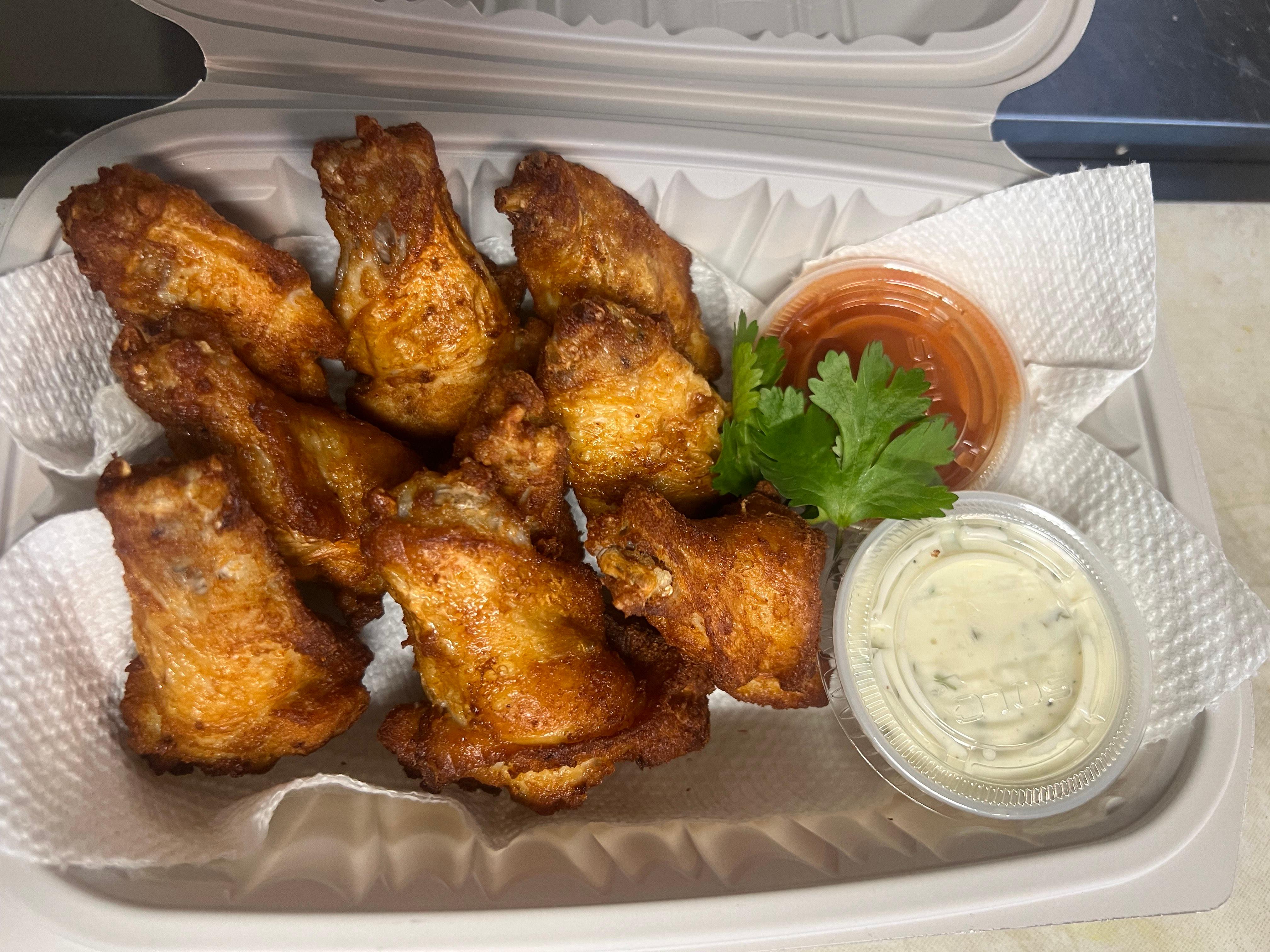 BUFFALO WINGS WITH RANCH/HOT FRUNKS.