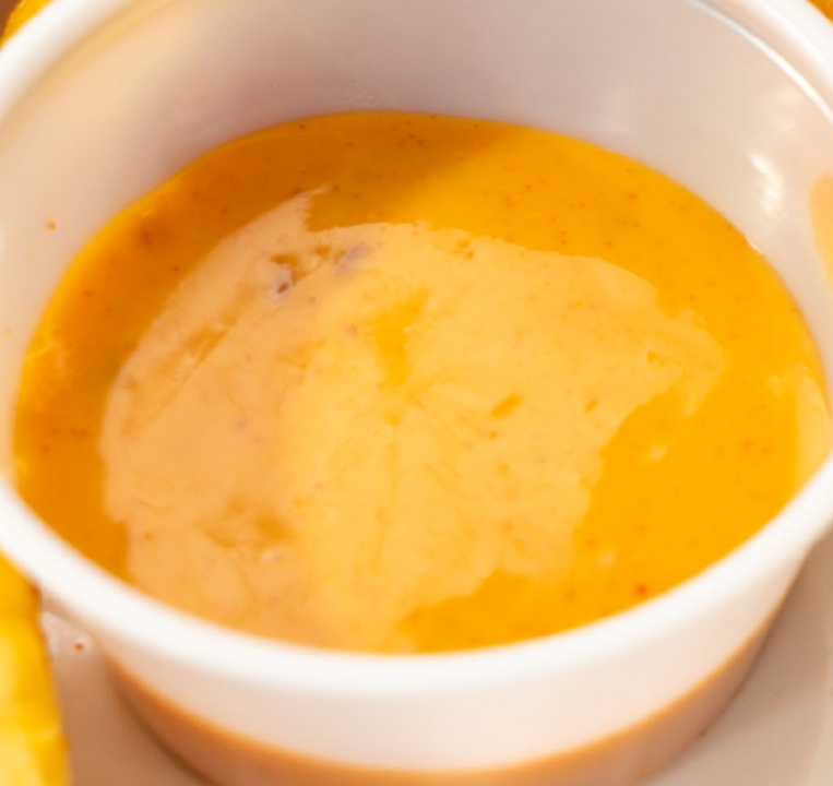 2 oz Que Dabra Sauce.