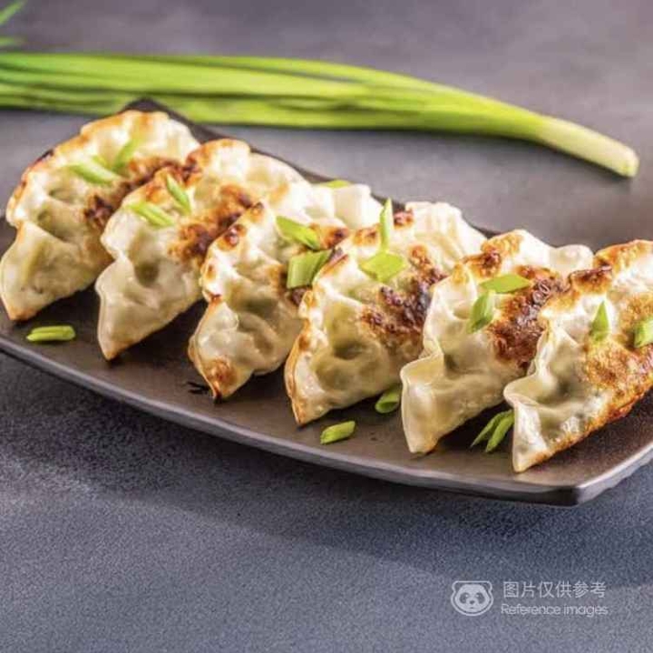 Folded Gold Gyoza.