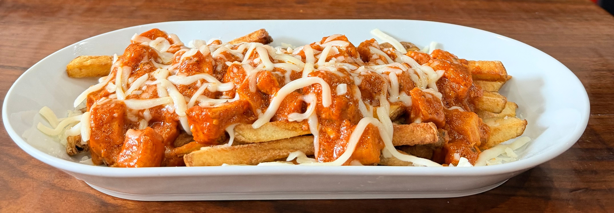 Butter Chicken Fries.