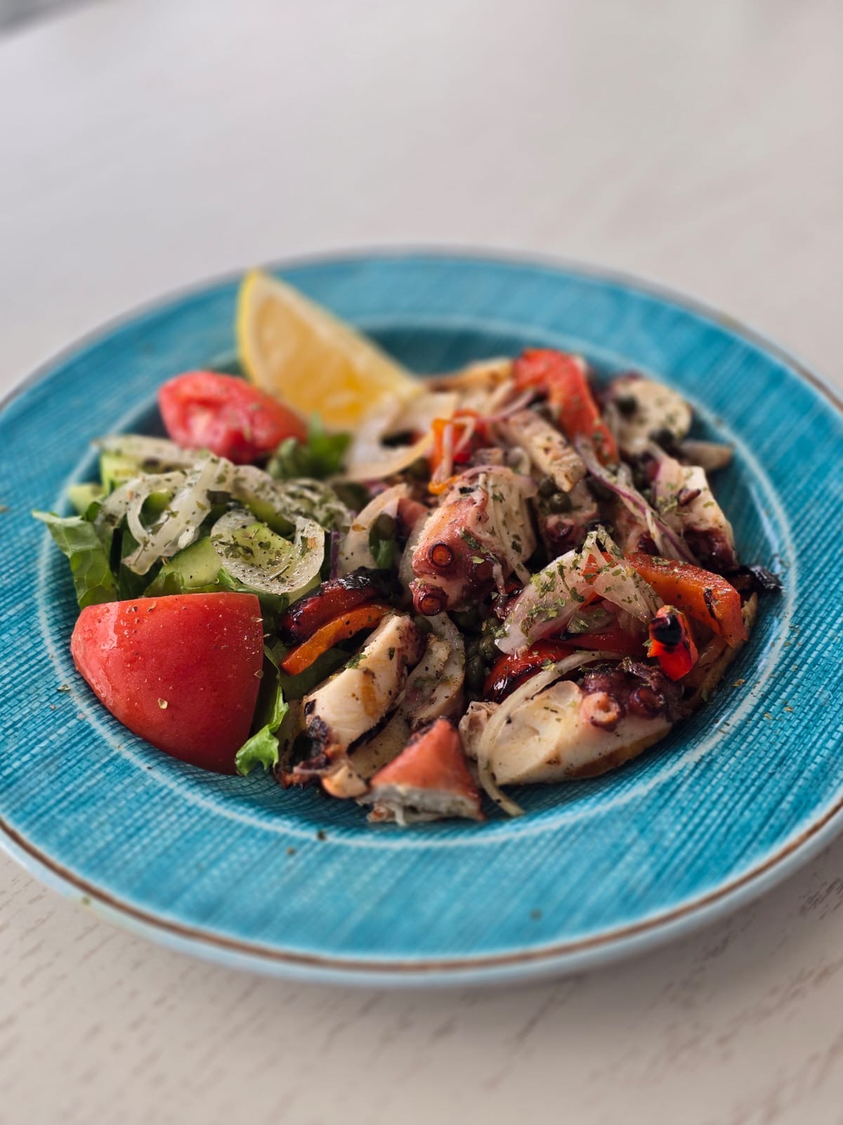 GREEK STYLE GRILLED OCTOPUS.