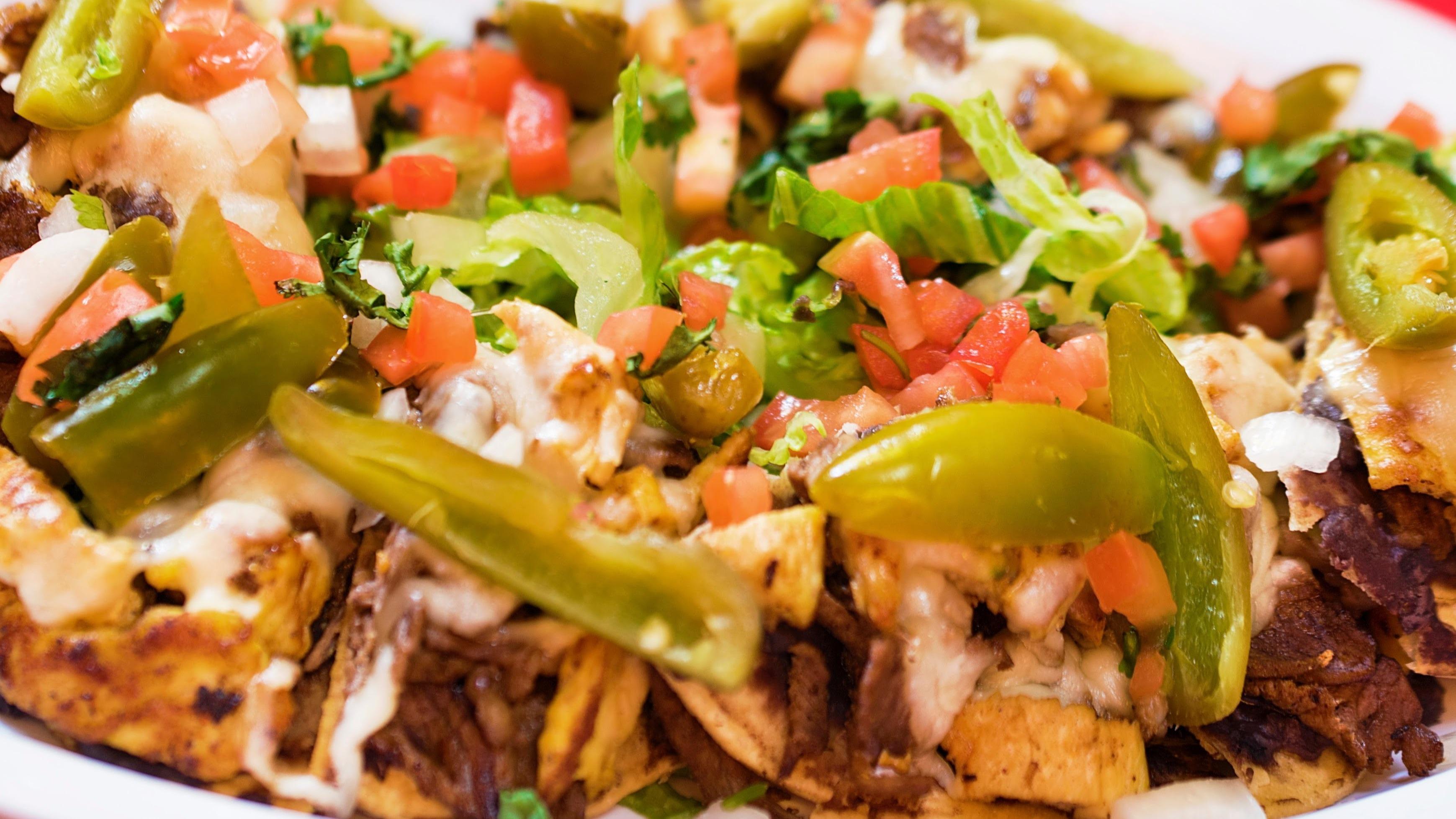 2 Meats Nachos.