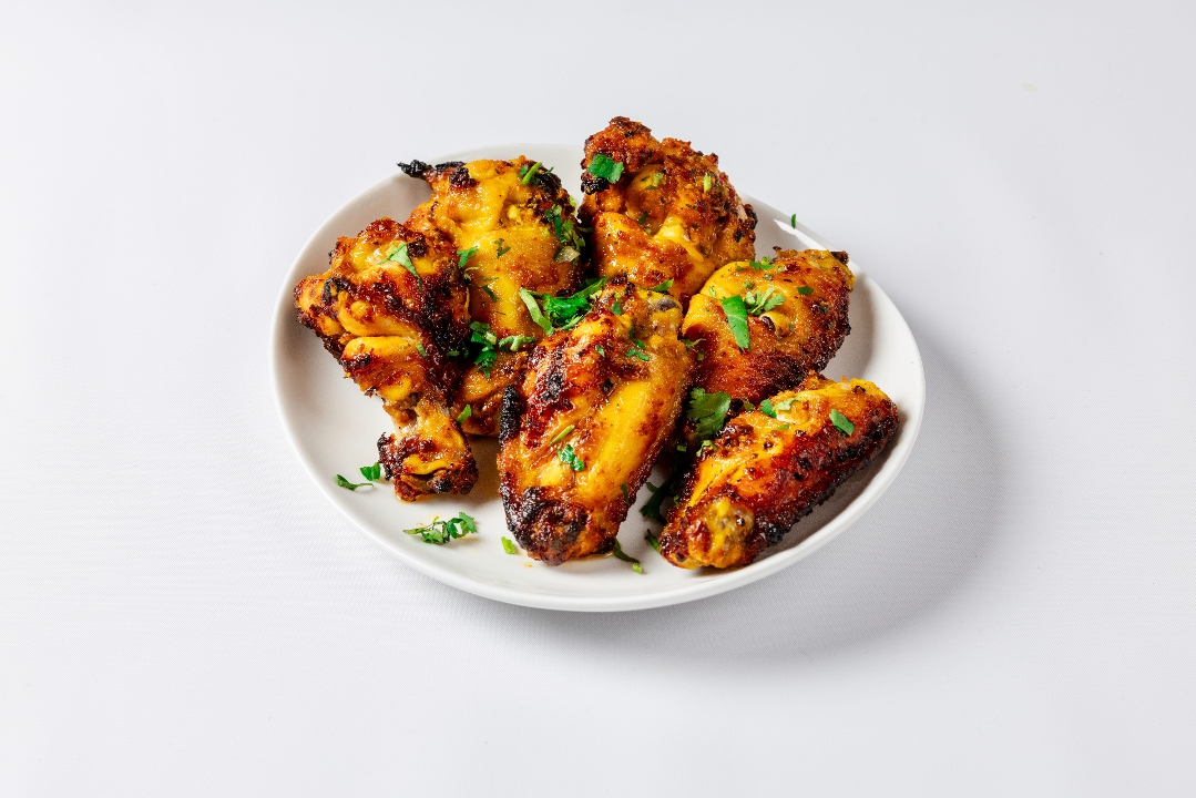 Achari Wings.