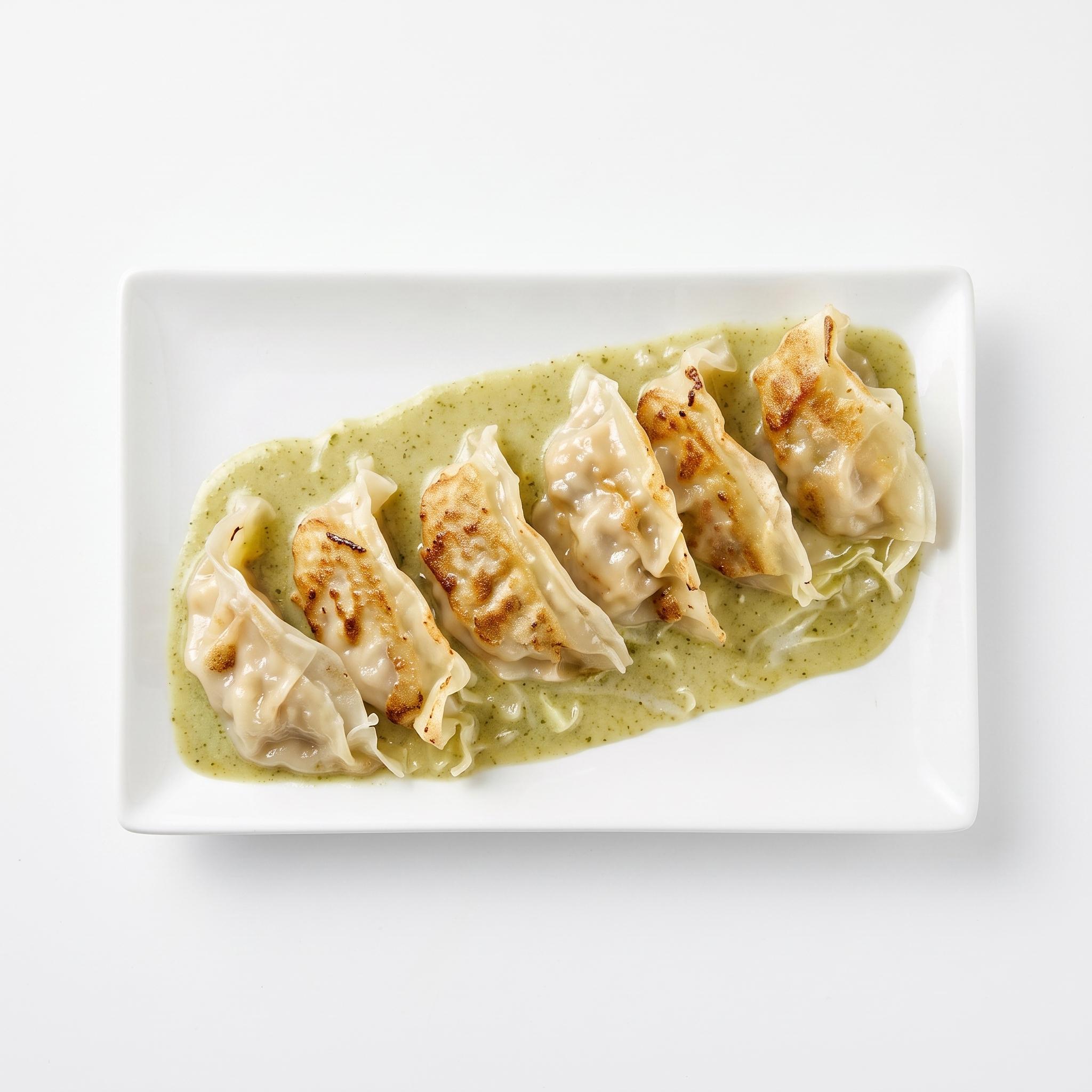 Chicken dumpling with curry sauce.