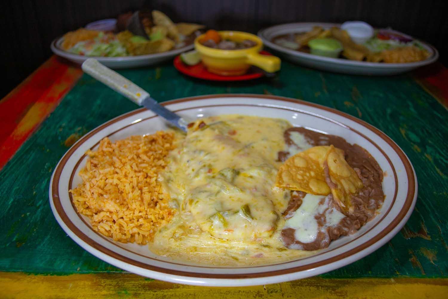 Hamburger Steak Topped with Chile con Queso, Served with Refried Beans and Spanish Rice. Choice of Corn or Flour Tortillas.