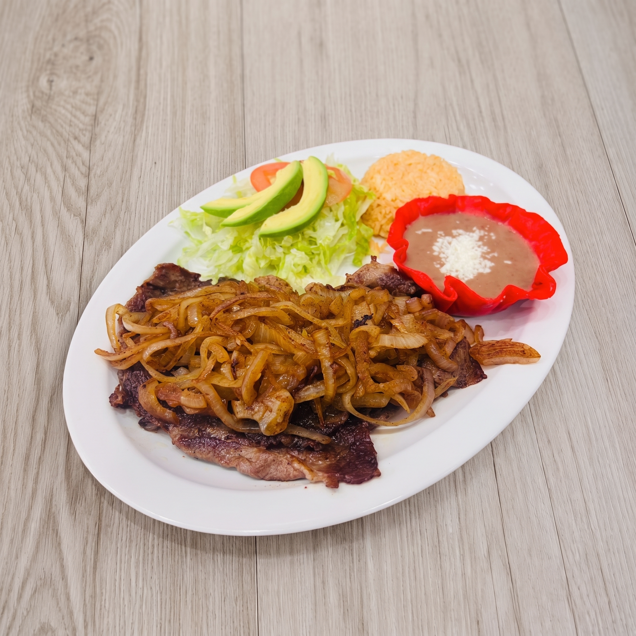 Bistec Encebollado Plate.