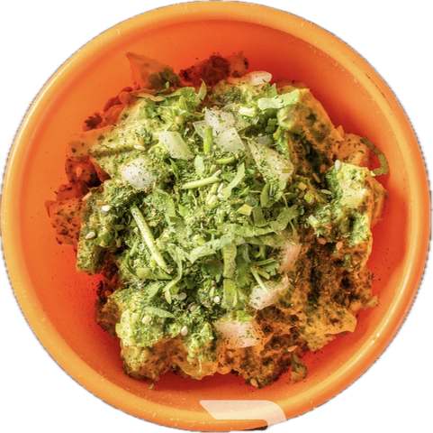 Chunky Avocado Hummus, Our Guacamole, Cilantro, Onions, Zatar, Zhoug sauce, Pita chips.