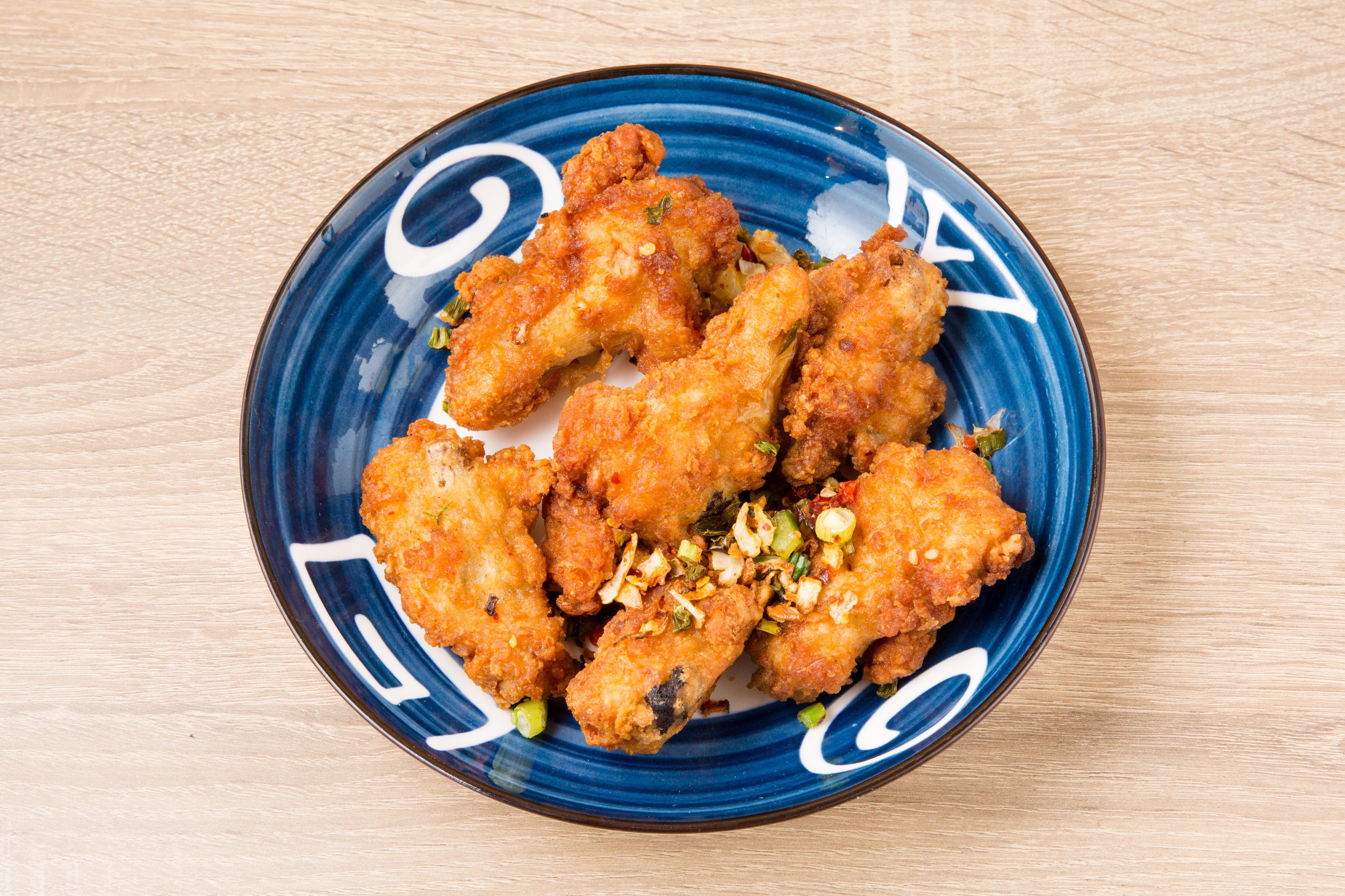 Fried Chicken Wings Over Rice.