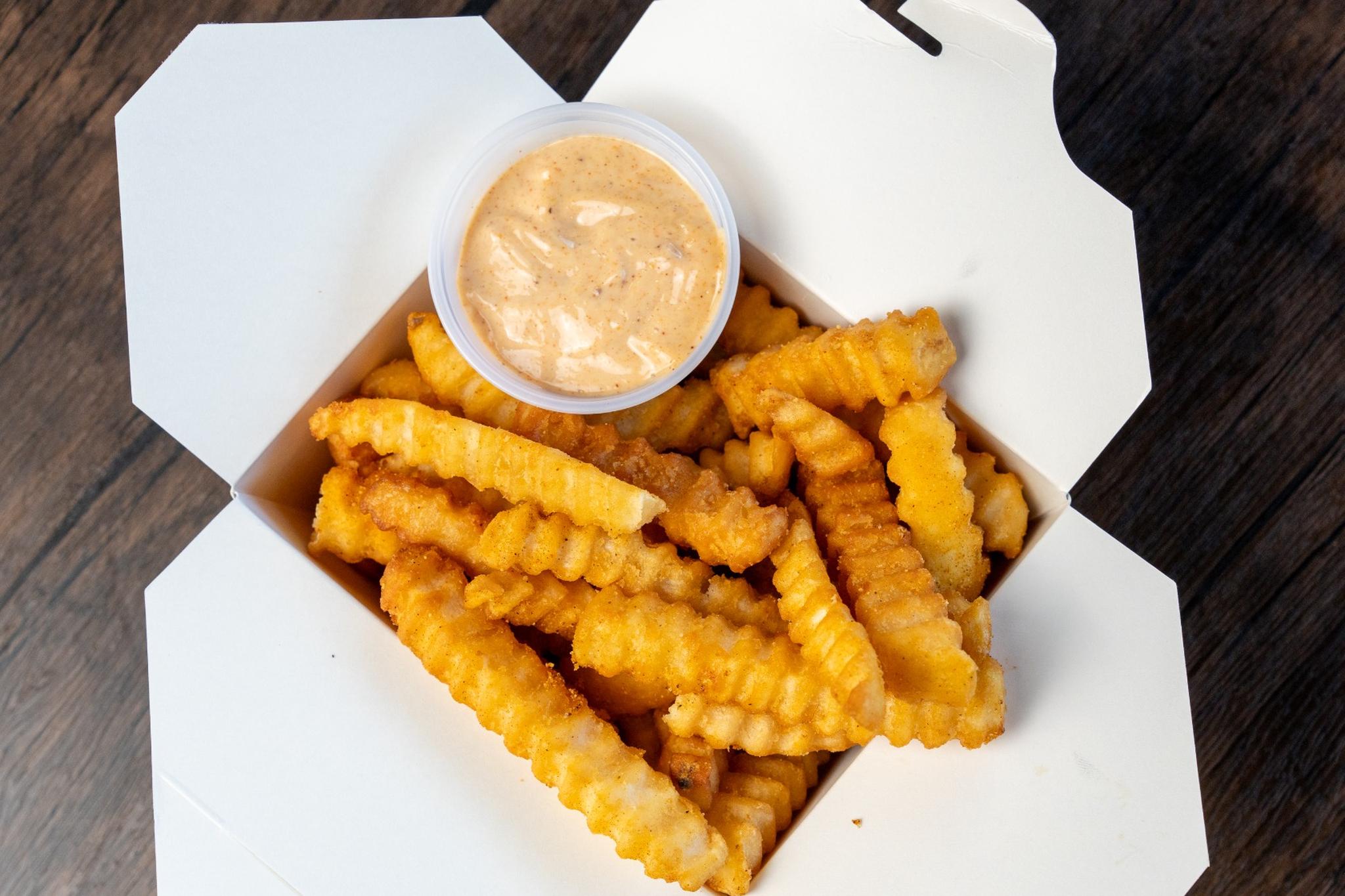 Side Seasoned Krinkle Kut Fries.