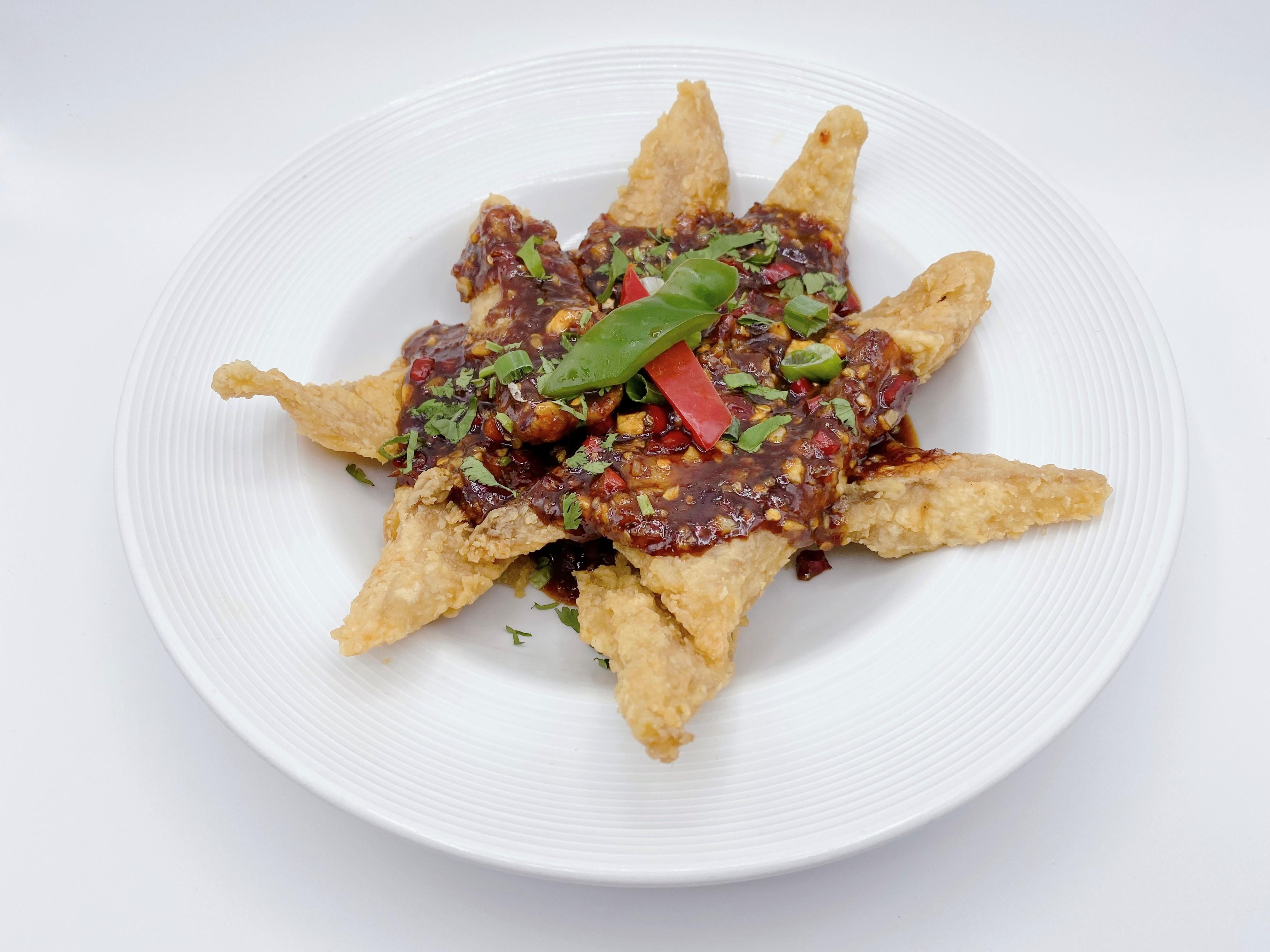 Golden Tilapia - Ka Praw Spicy Basil Sauce.