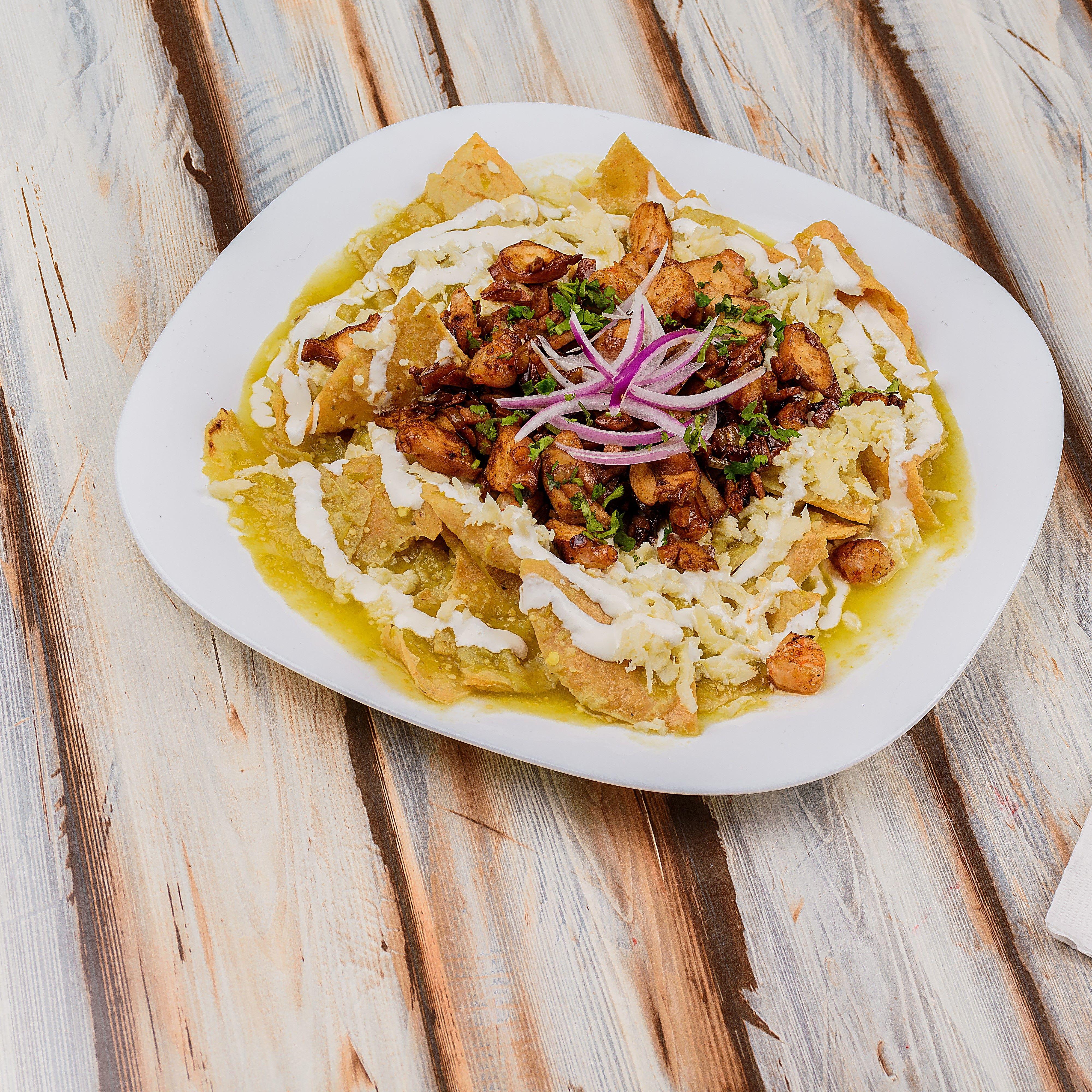 Chilaquiles with meat.