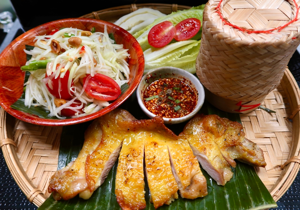 Grilled Chicken with Som Tumm Sticky Rice.