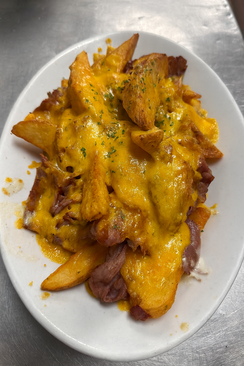 CHEDDAR MOZZARELLA WEDGE FRIES.