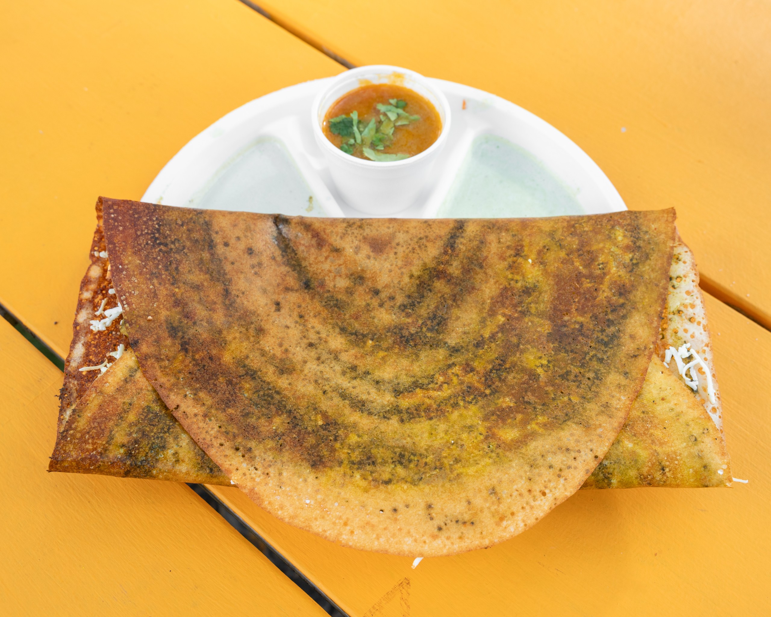 O - Butter Schezwan Dosa w/ Cheese and Cream.