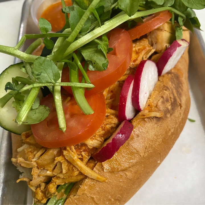 PANES CON POLLO/SALVADORIAN CHICKEN SANDWICH.