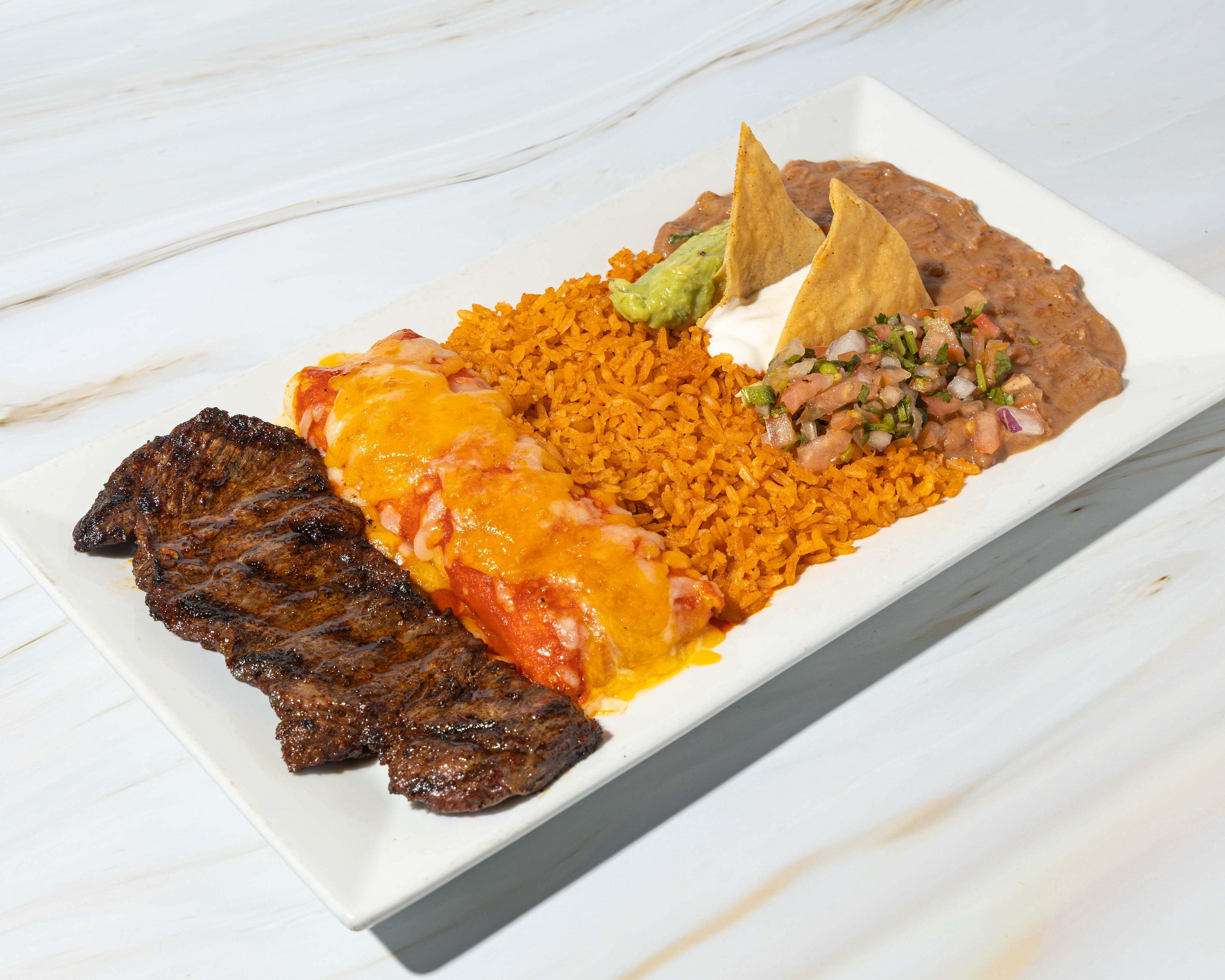 Steak And Enchilada Platter.