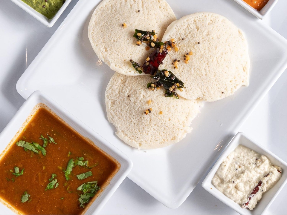 Plain Idli with Sambhar and Chutney.