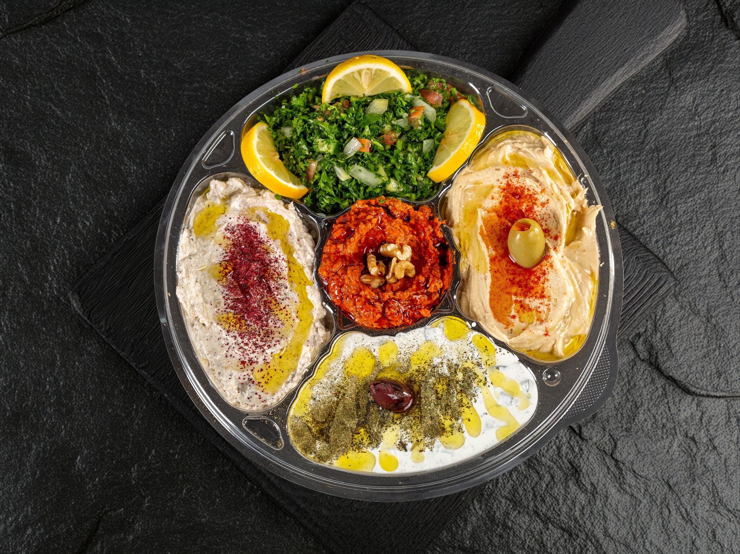 Large Mix Appetizer/ مقبلات مشكلة كبيرة.