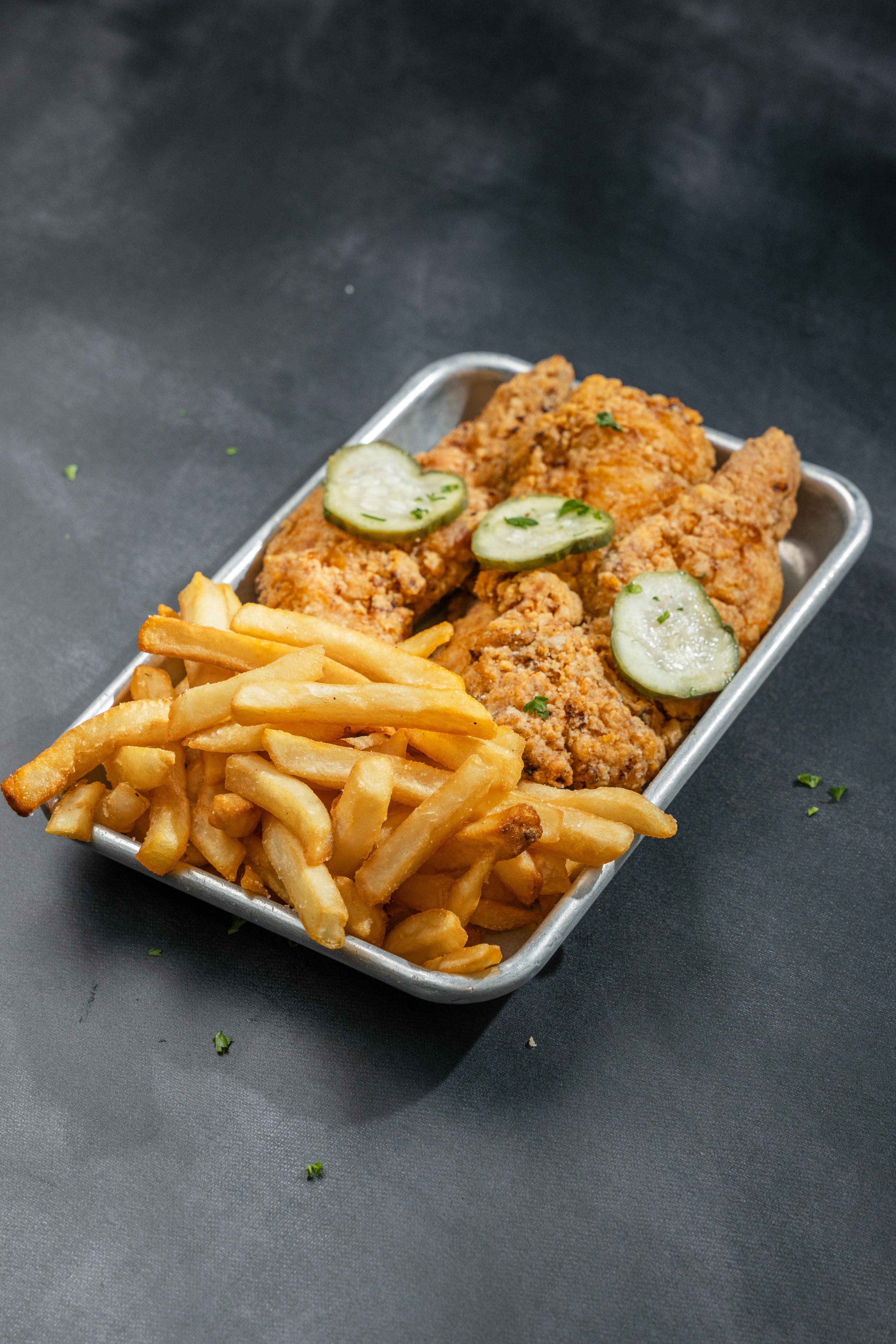 3 Jumbo Chicken Tenders w/ Fries.