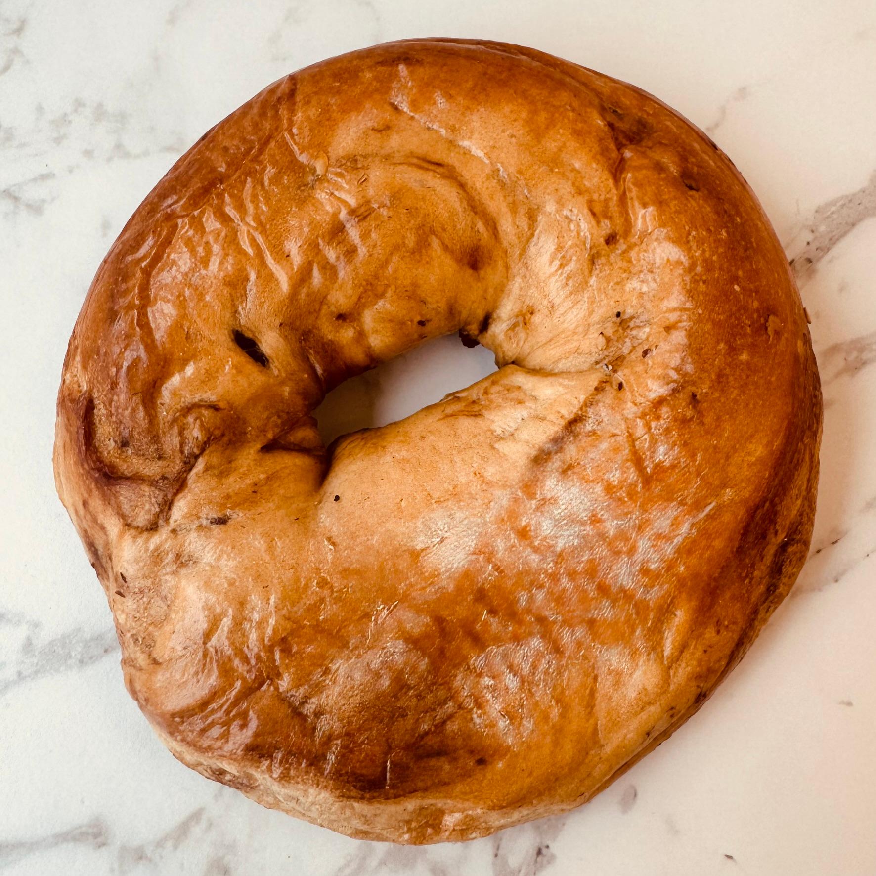 Flat Cinnamon-Raisin Bagel.