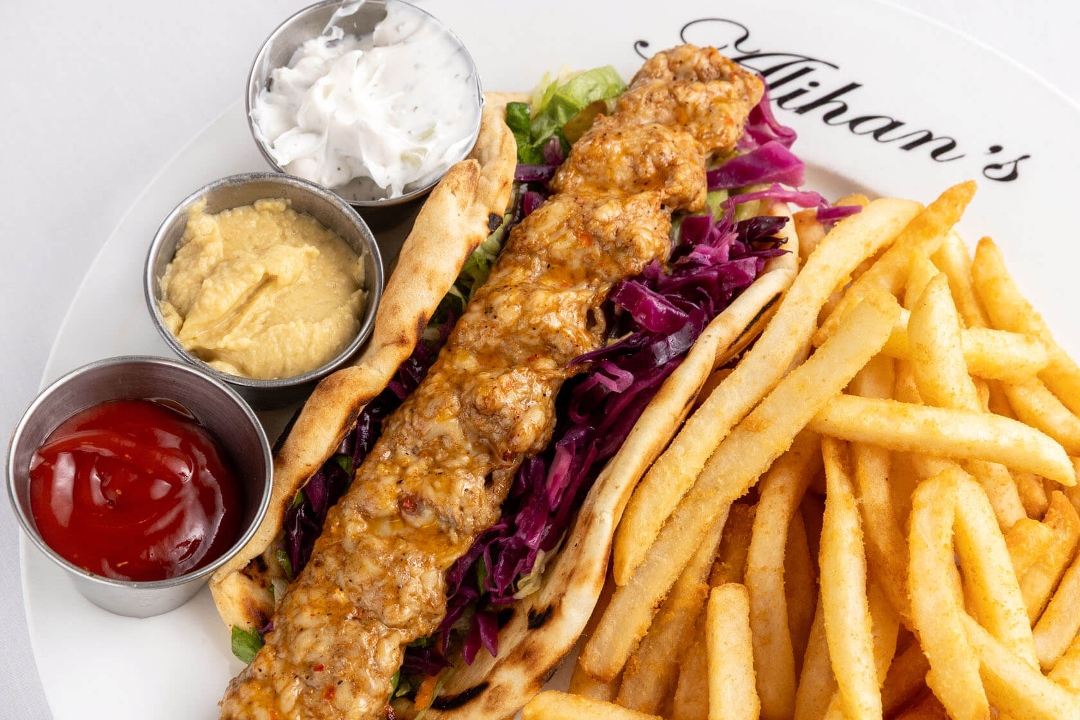 Lunch Chicken Adana, Pita, Salad.