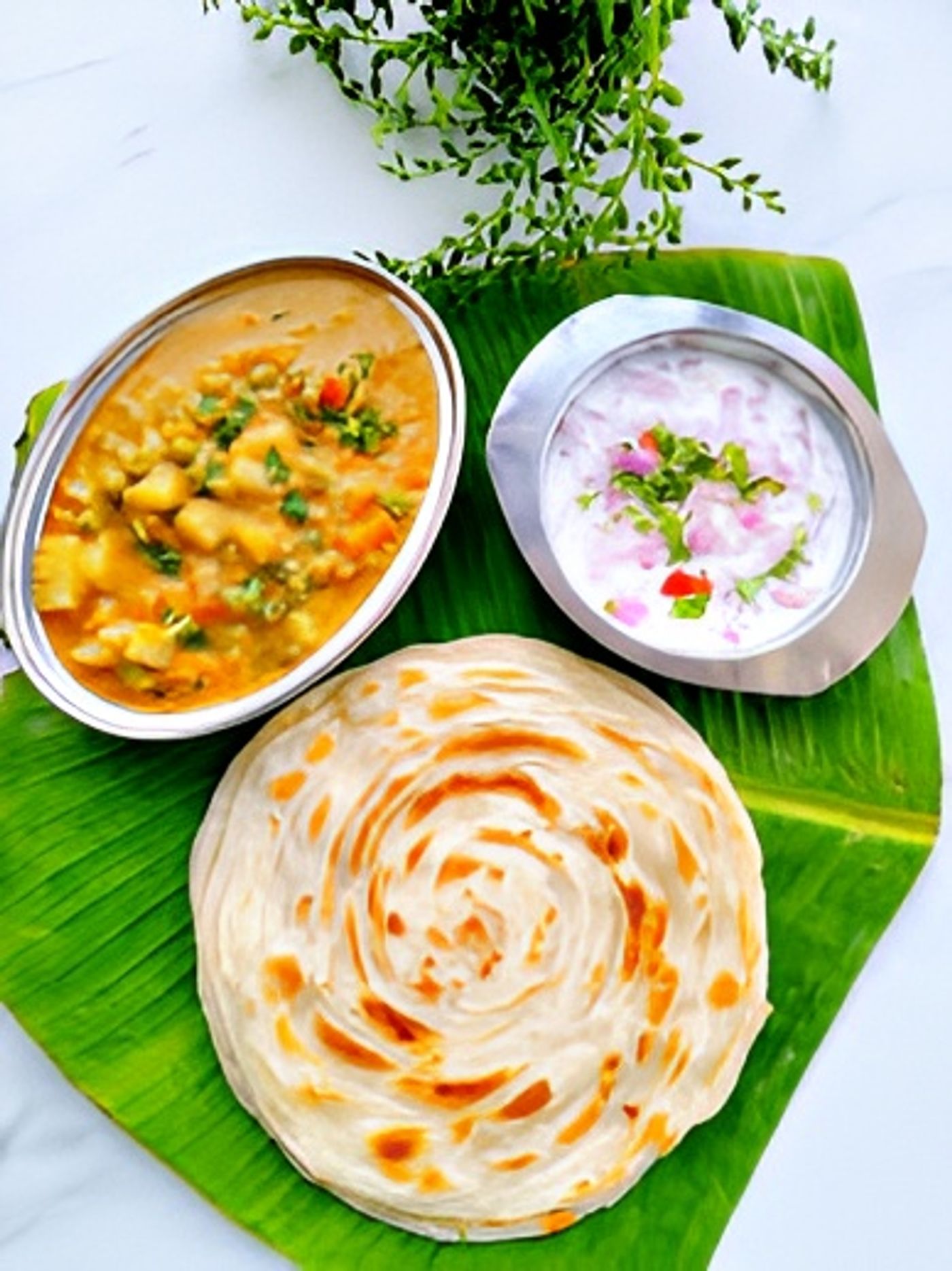 Parotta with veg kurma.