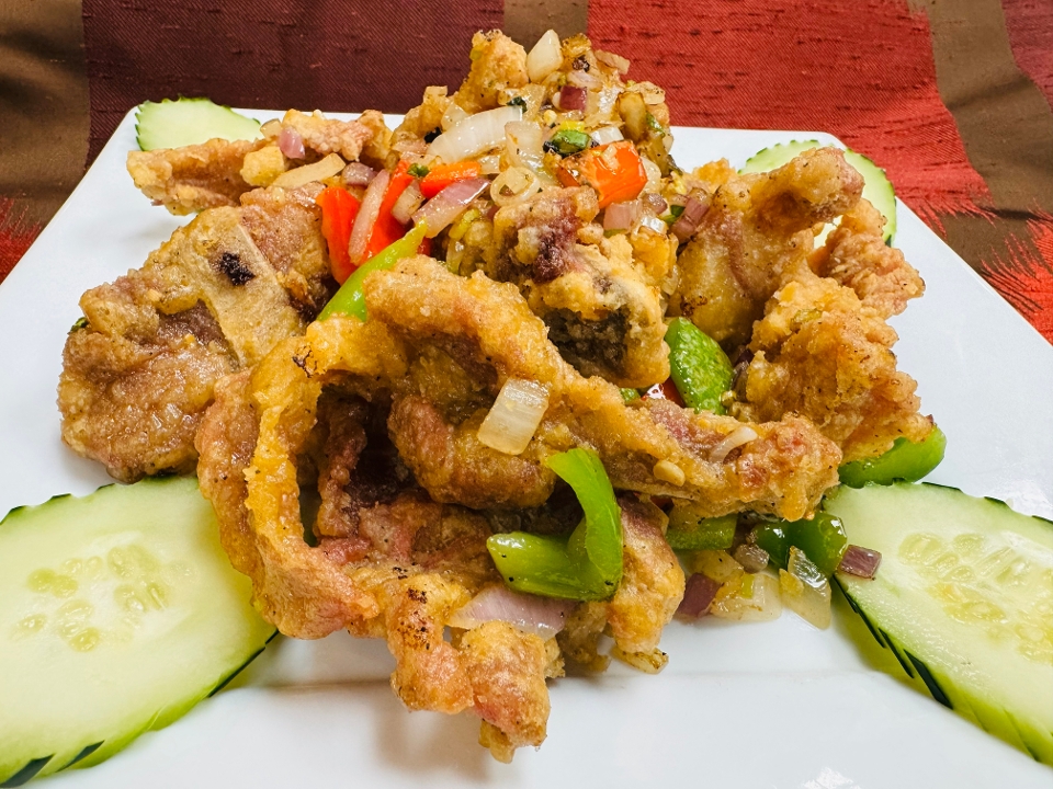 S10. Pork Chops Stir-Fried with Salt and Pepper - Suon Rang Muoi.