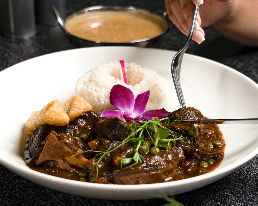 Seco De Cabrito (catering).