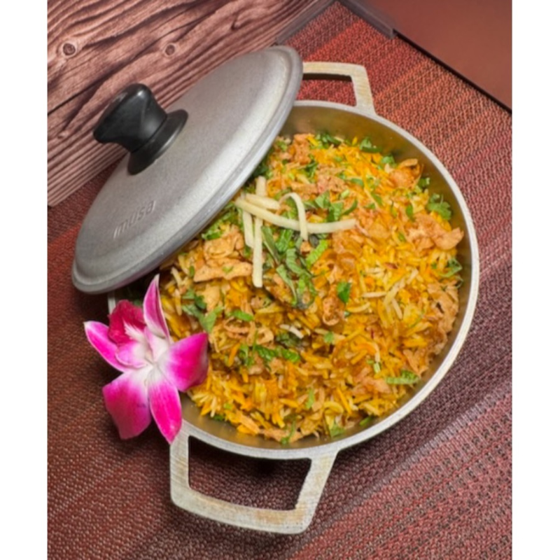 Handi Dum Baby Goat Biryani.