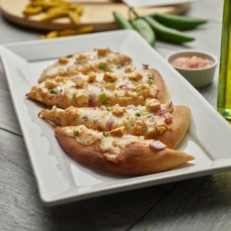 Shahi Paneer Naan Pizza.