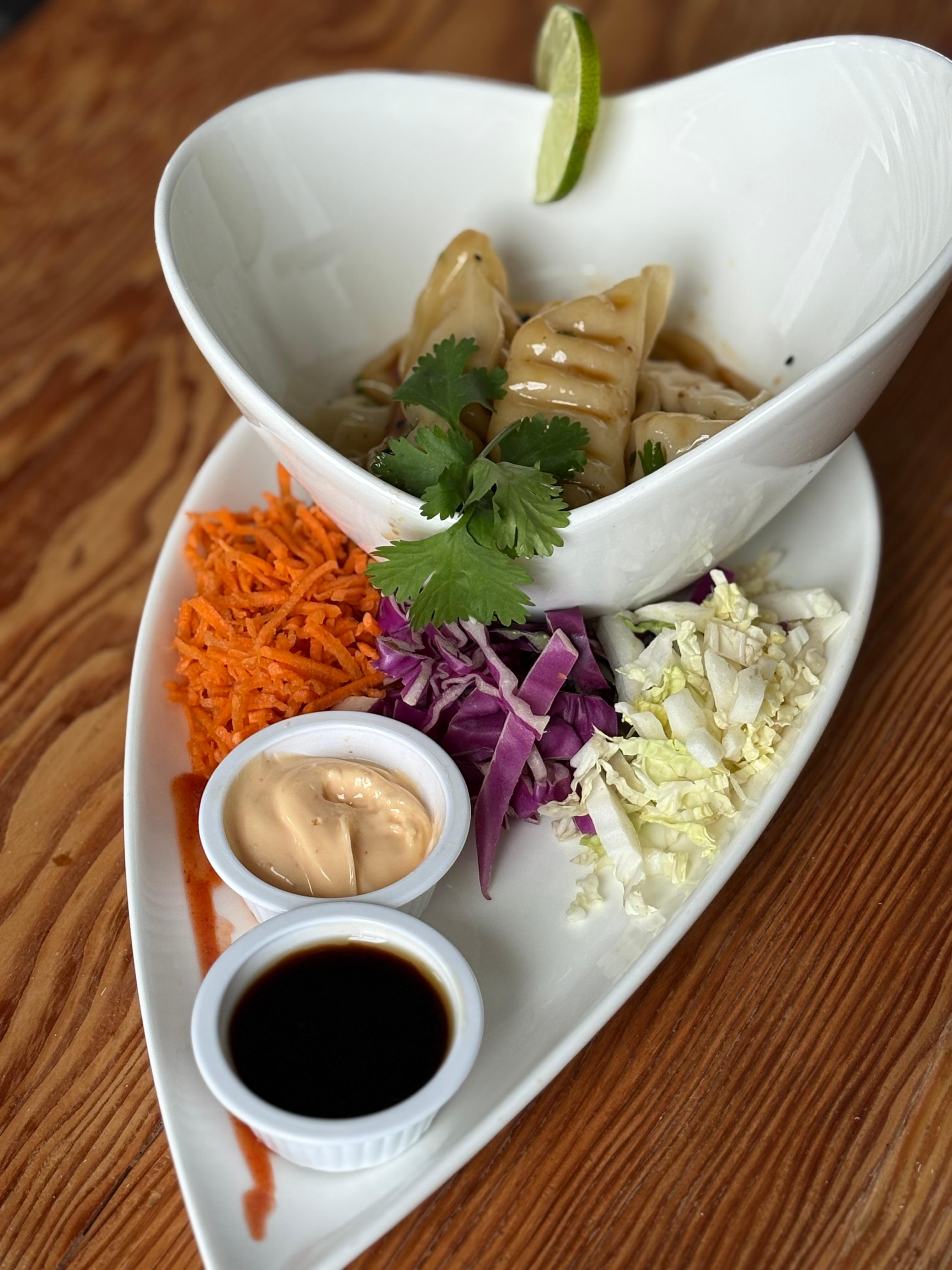 Sesame Szechuan Pork Dumplings.