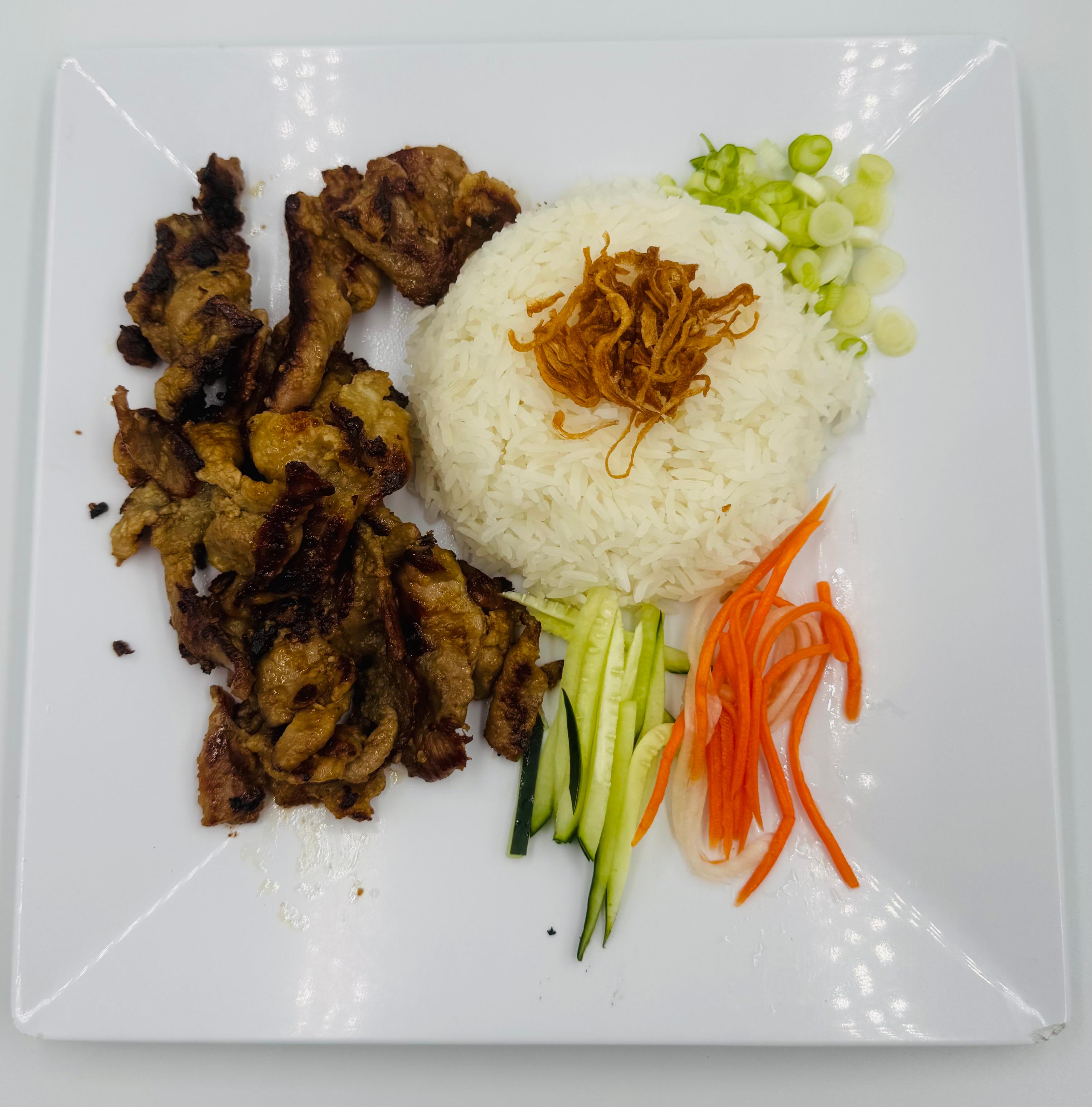 Pork chop with steamed rice.