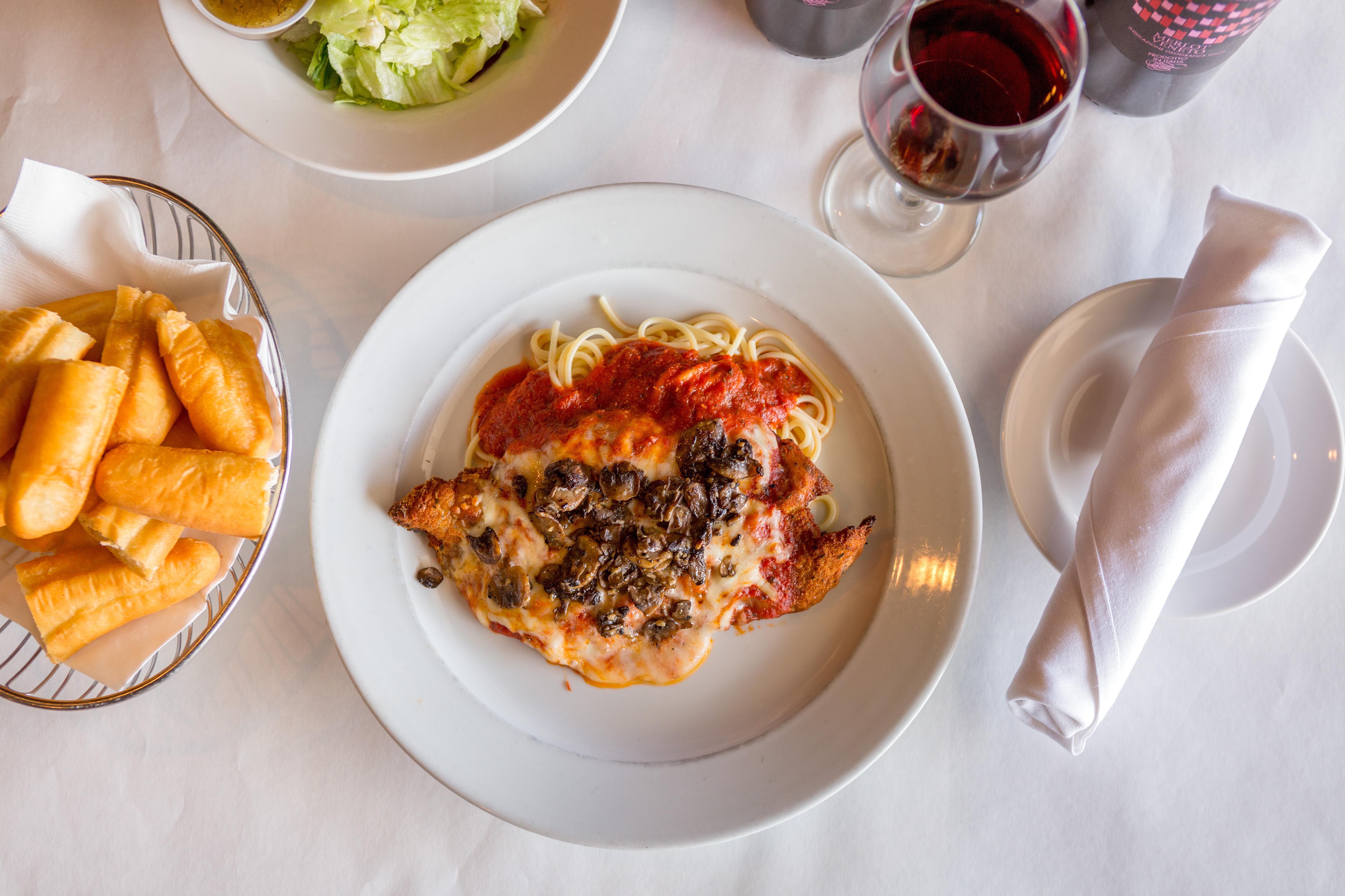 (L) Fresh Veal Parmigiana.
