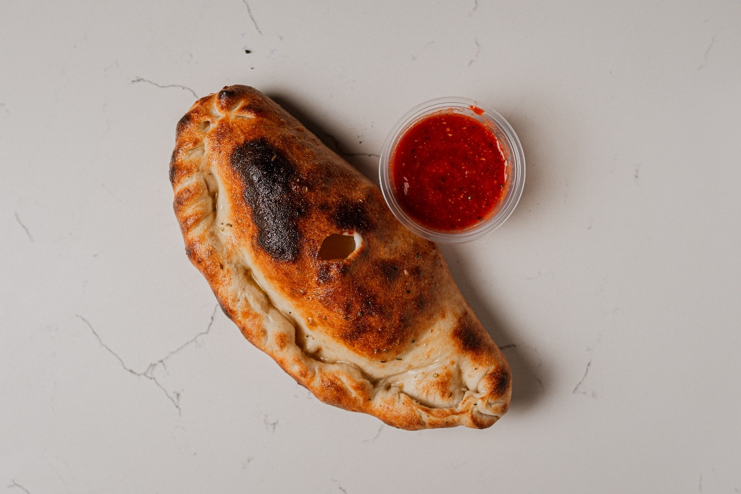 Buffalo Chicken Bacon Calzone.