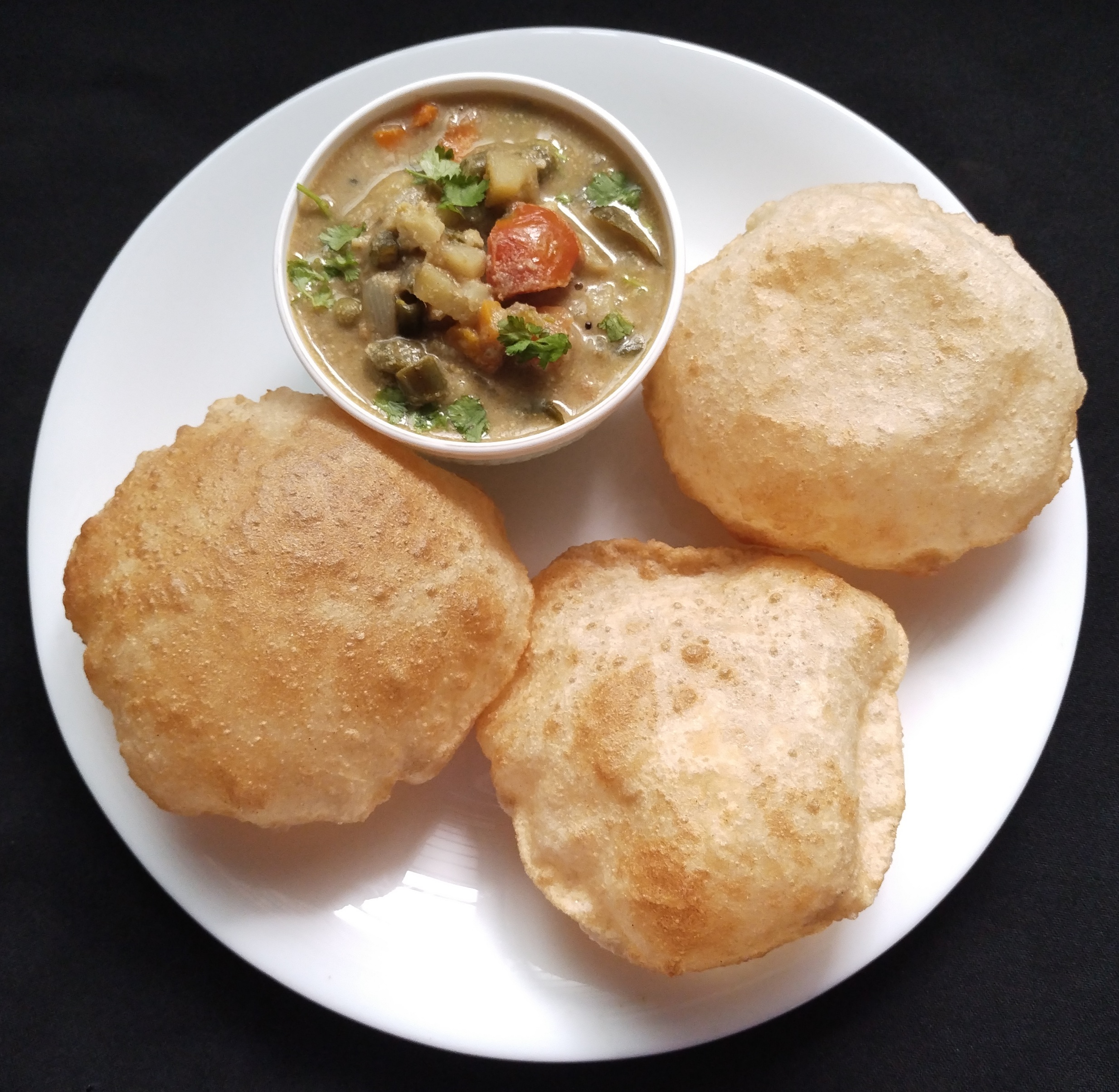 Poori with Veg Kurma.