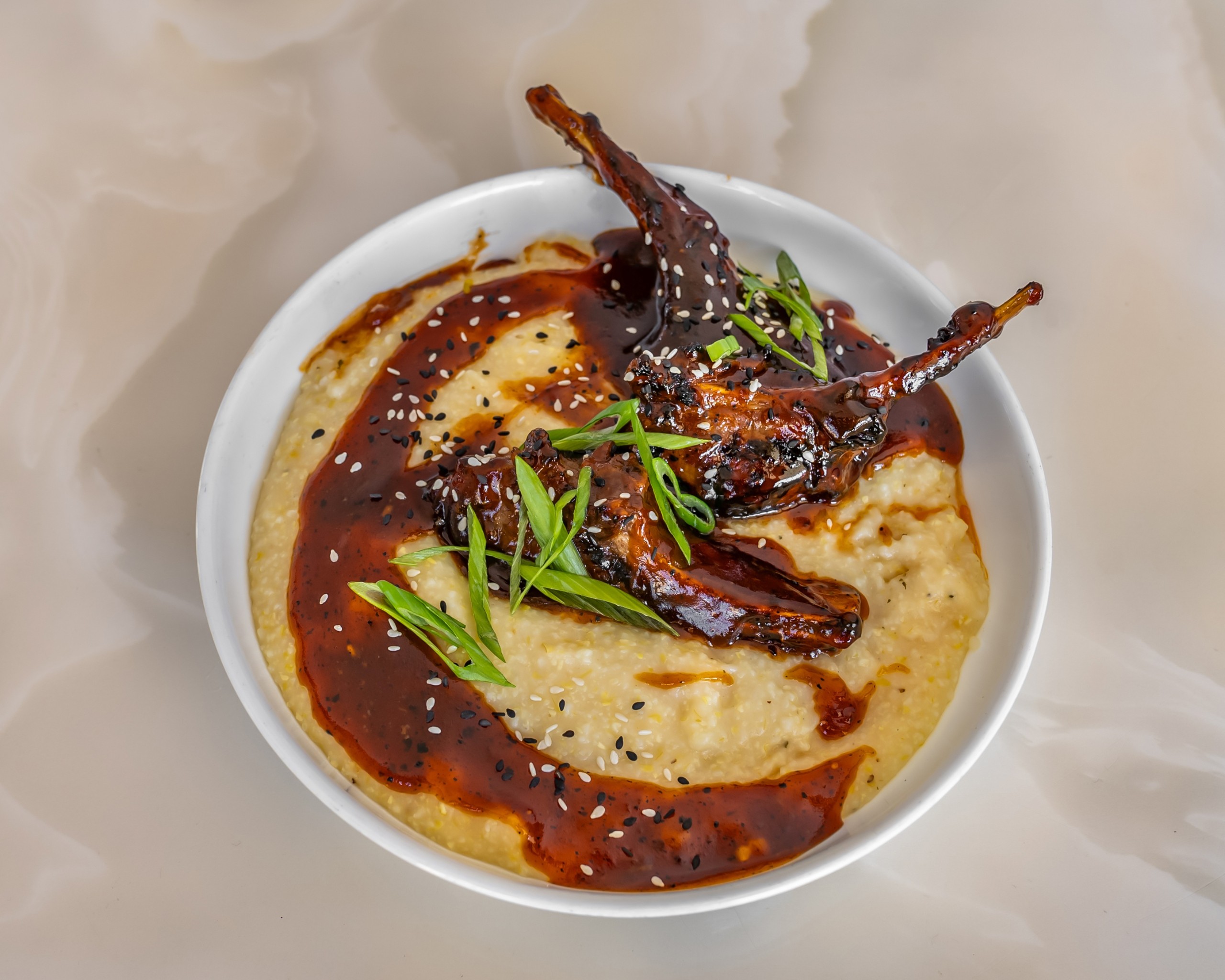 Frenchie - Lamb & Grits.