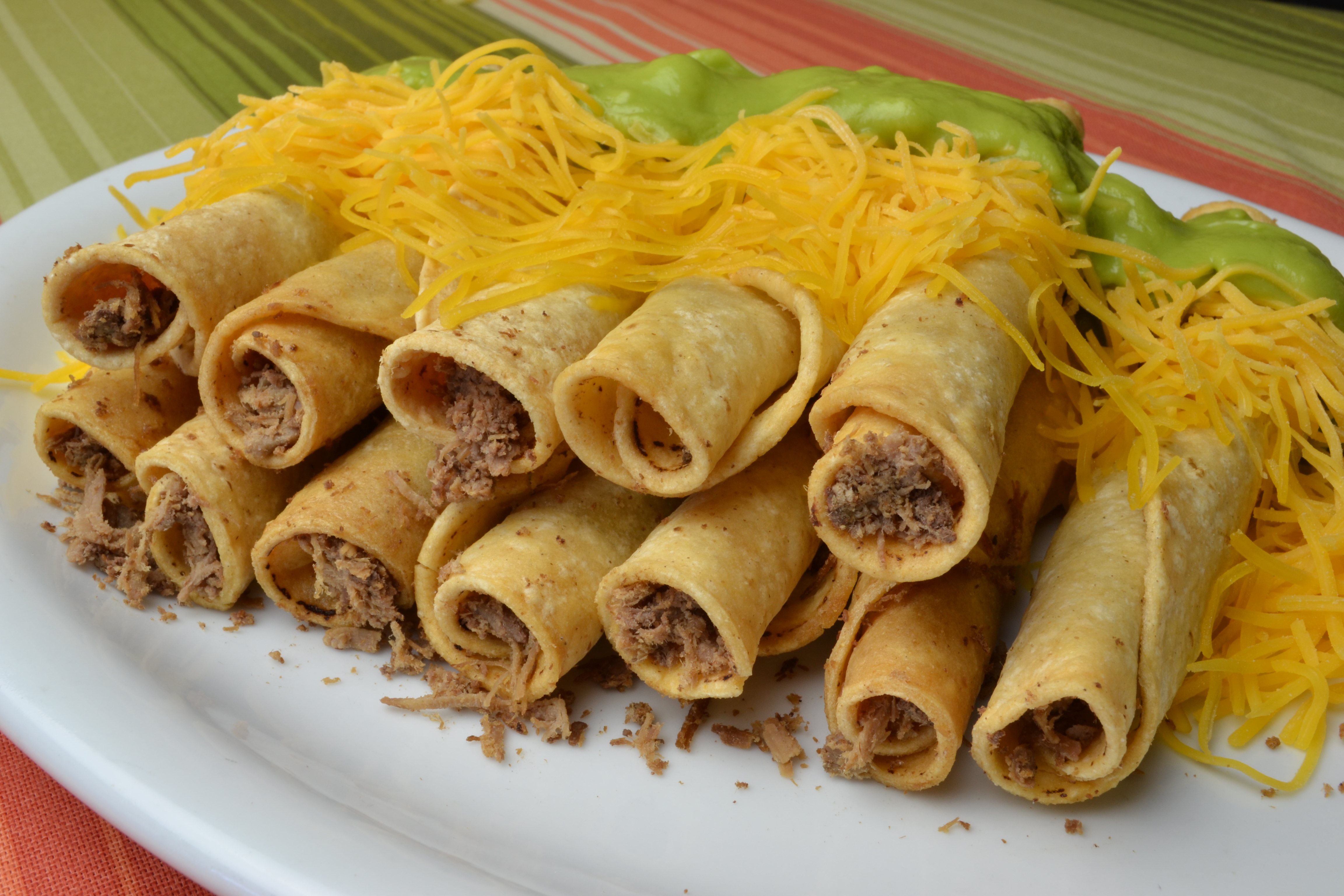 20 Rolled Tacos with Cheese.
