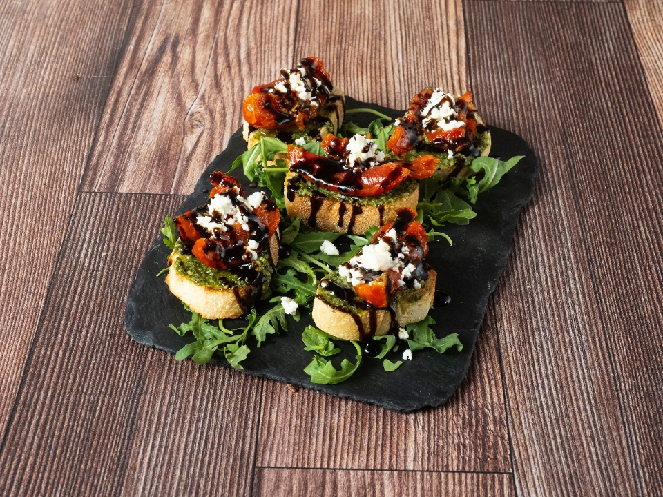Marinated Tomato and Pesto Crostini.