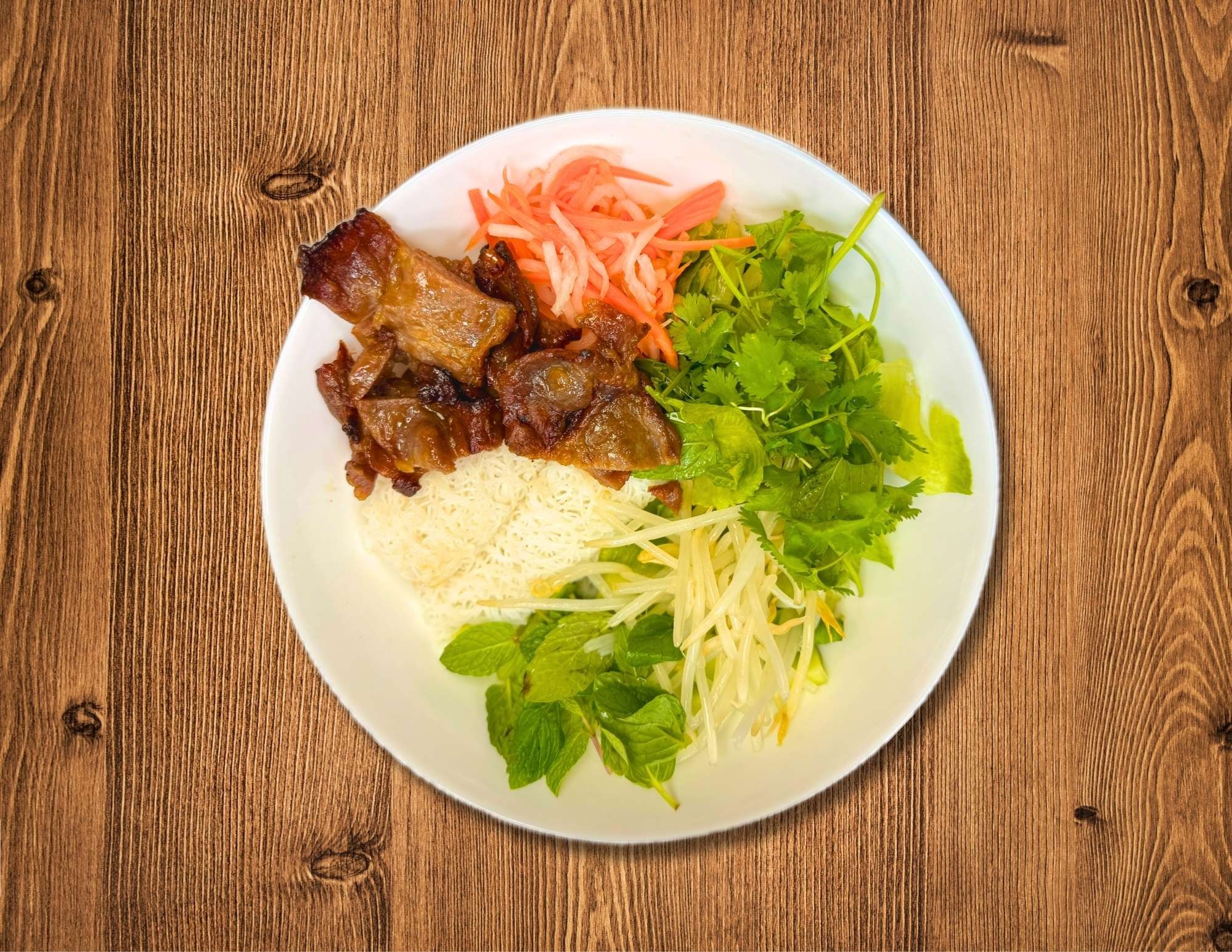 B5. Saigon Sizzle - The Lemongrass Pork Bowl.