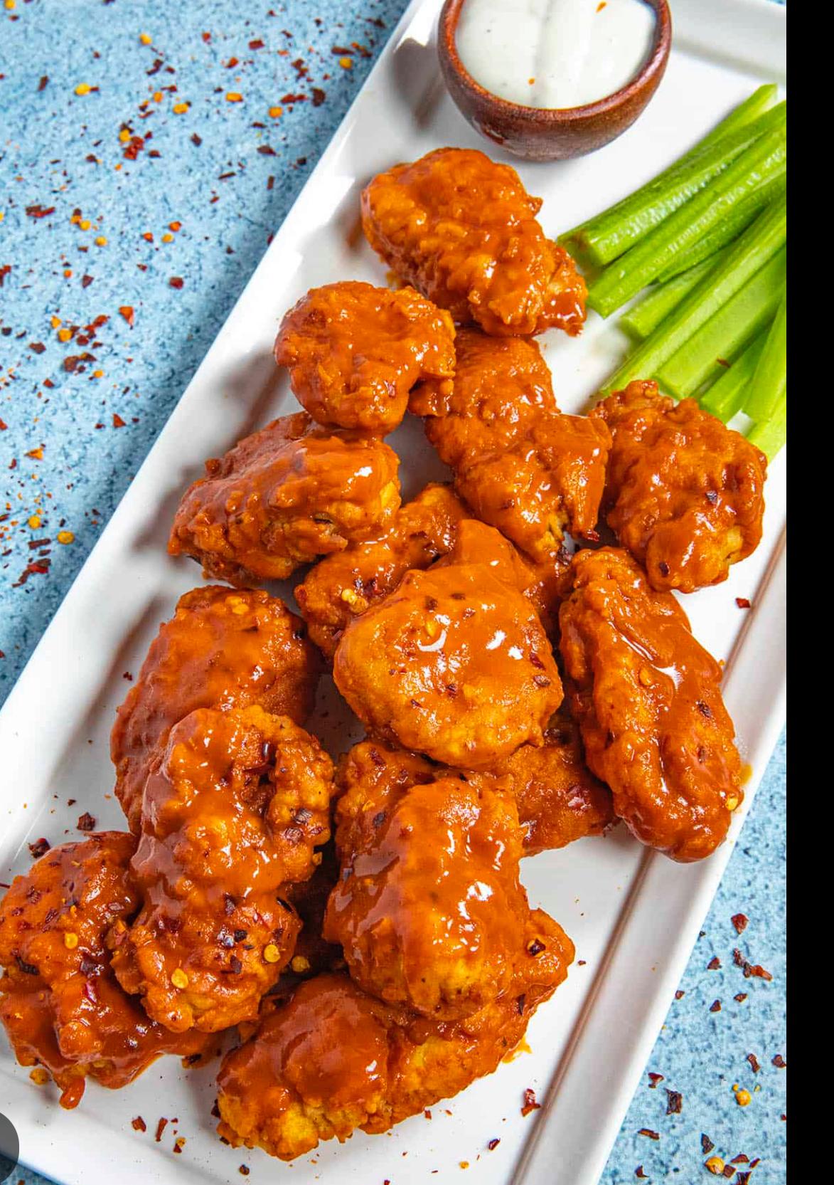 Large Cheese W/ 1 Topping & Boneless Wings.