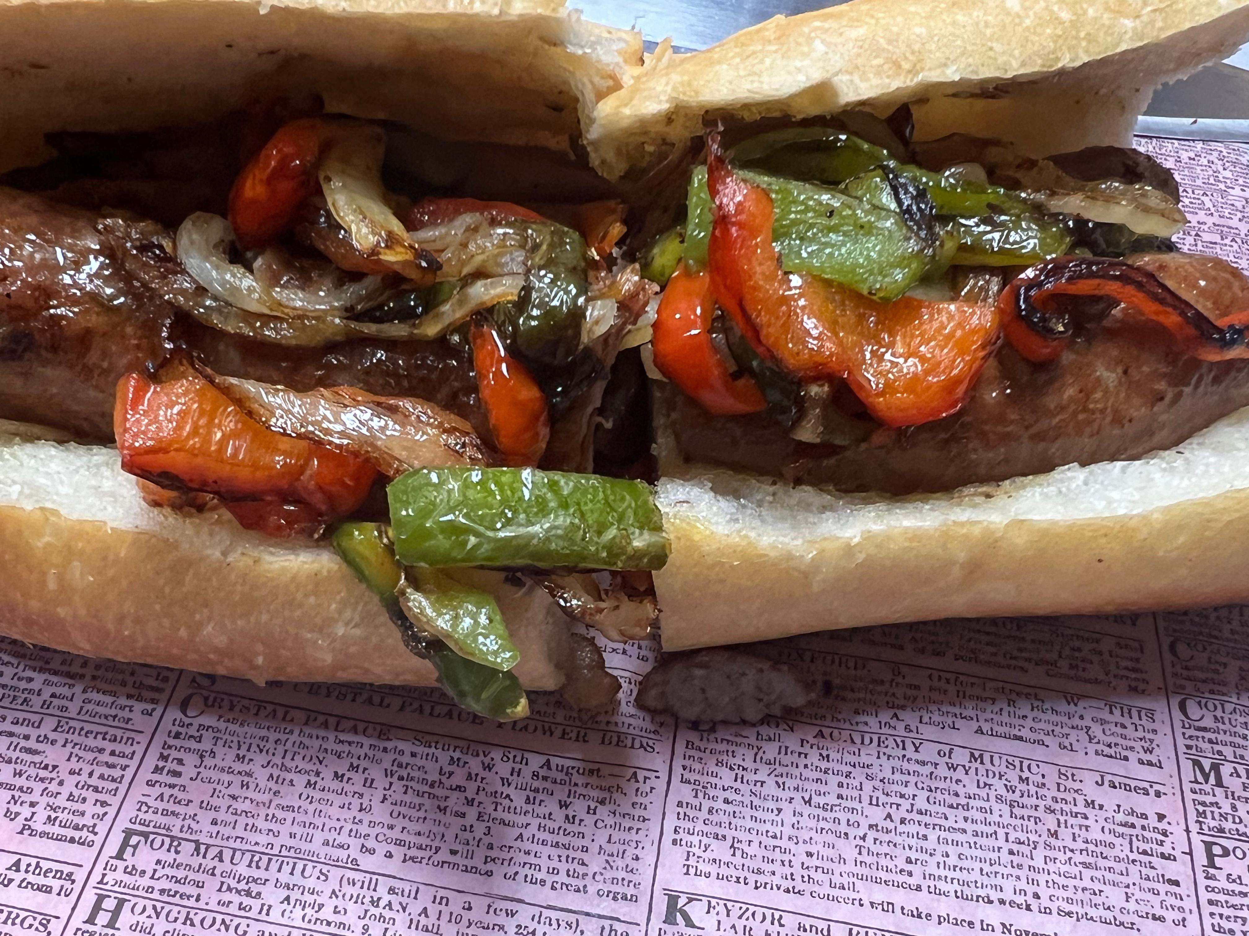 Grilled Sausage Sub with fries.