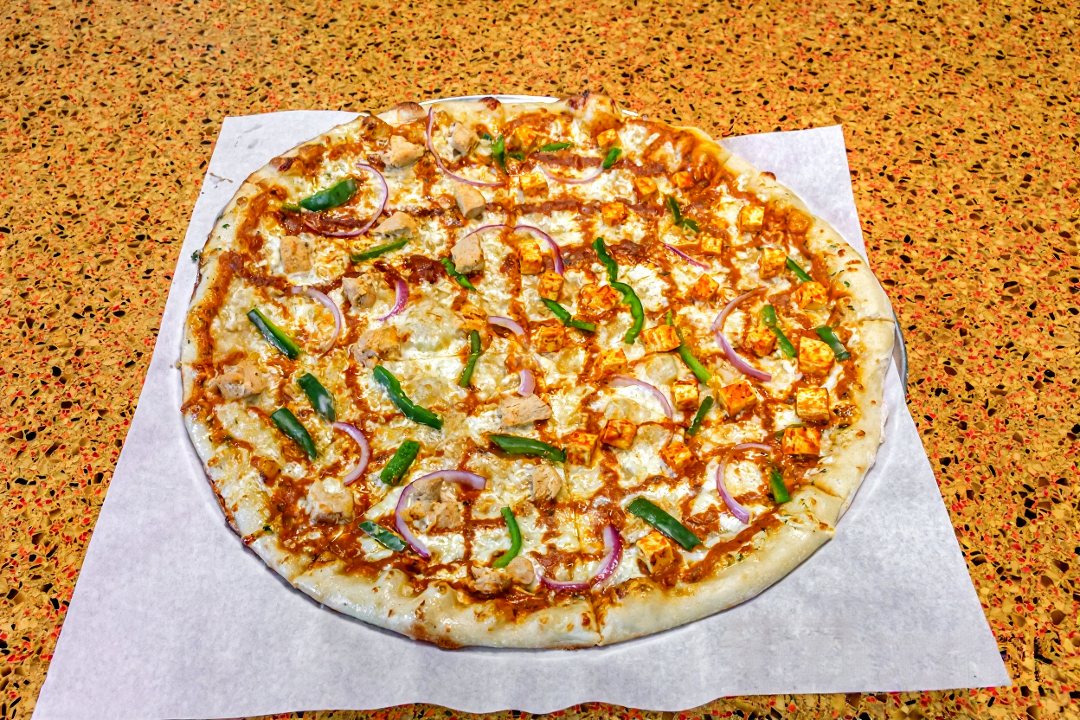Medium Butter Chicken Pizza.