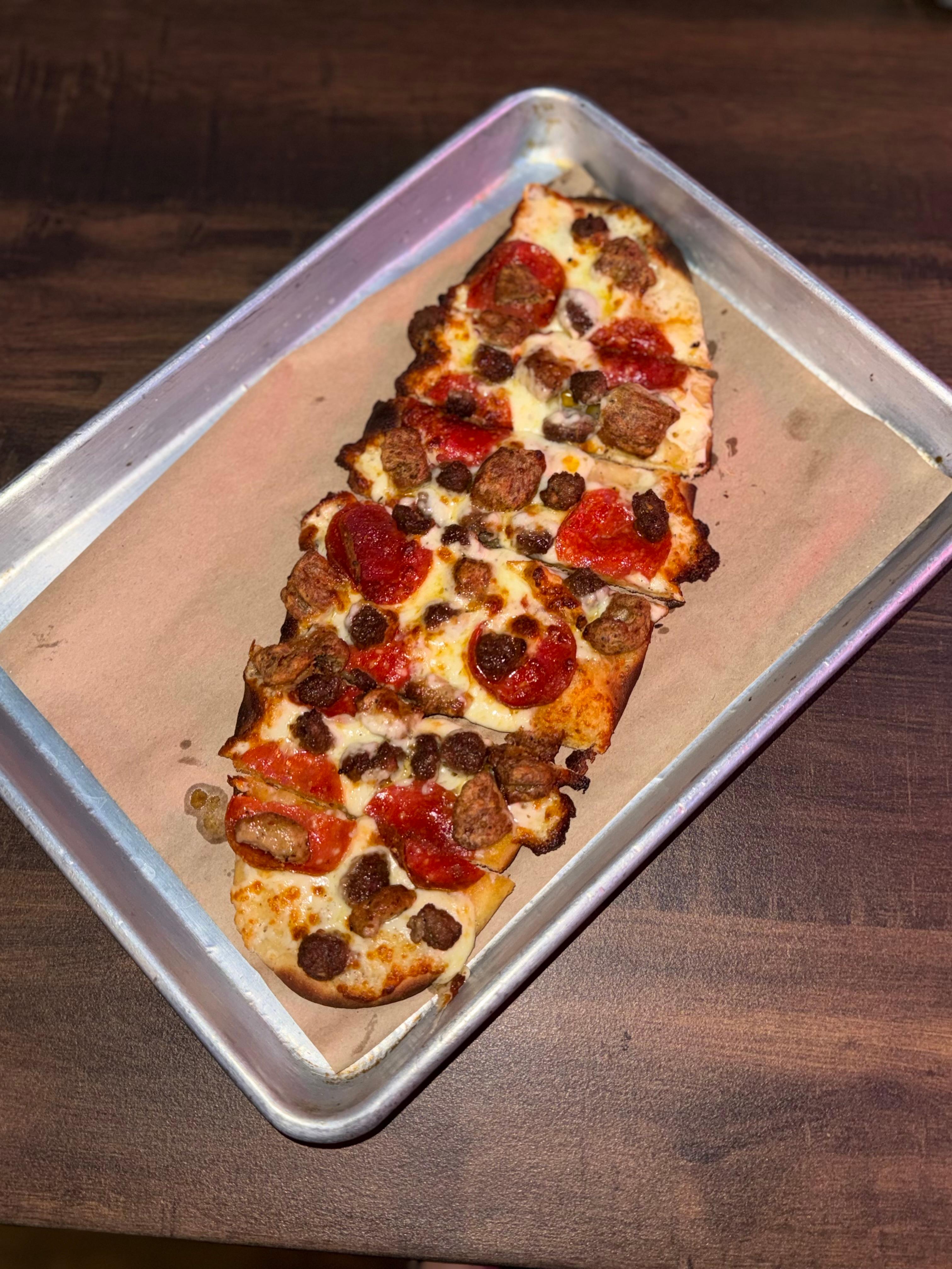 Triple Meat Flatbread.